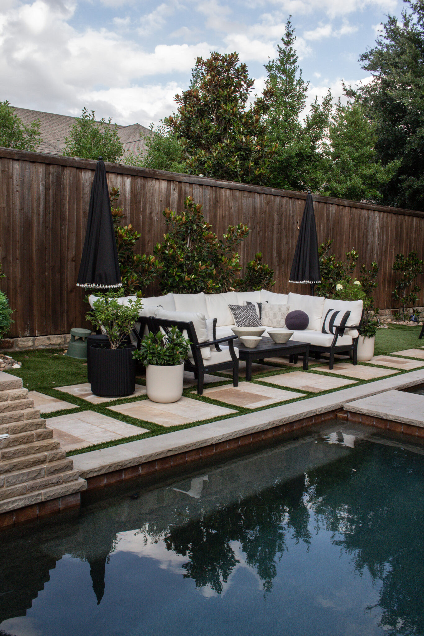 If you're dreaming of a backyard that feels timeless and elevated, this black and white transitional outdoor space is full of inspiration. From cozy seating to classic planters and outdoor dining ideas, every detail is beautifully curated. Shop the look through the link!

#LTKSeasonal #LTKHome