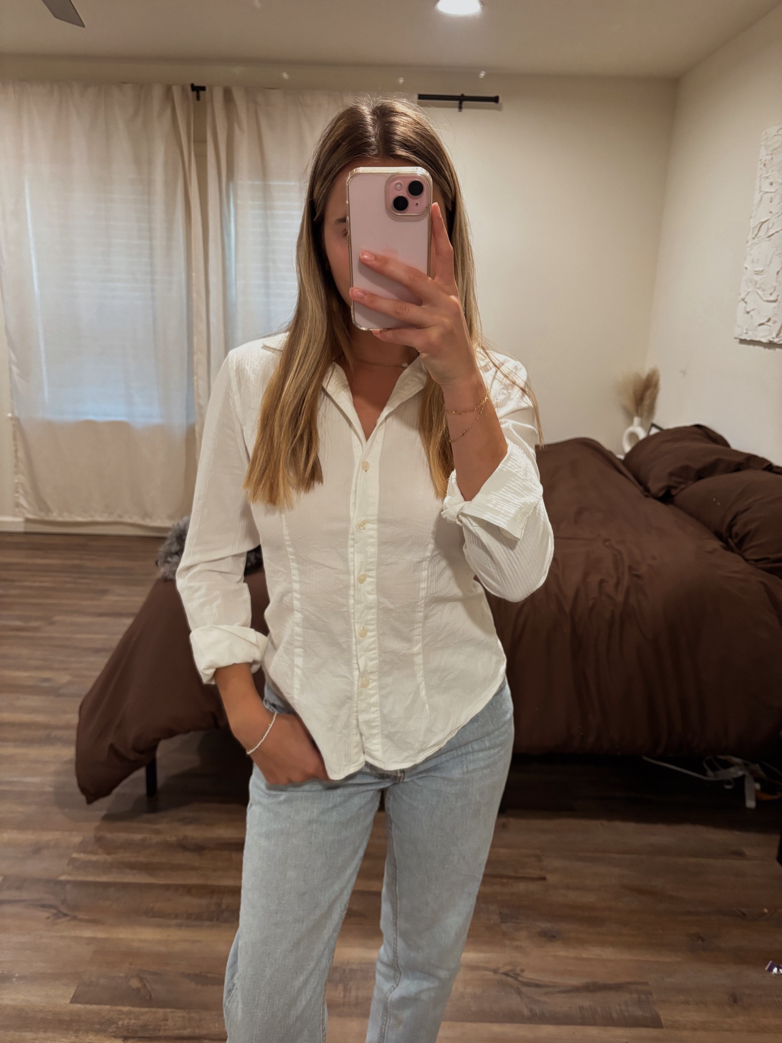 Love this simple office look 🤍 Wearing the Brandy Melville Mellie Top.

It’s super flattering, a little more form-fitting, and hugs your waist perfectly. Paired with light-wash Levi’s for an effortless, put-together vibe that still feels comfy for a day at work. 

#LTKPetite #LTKWorkwear #LTKStyleTip