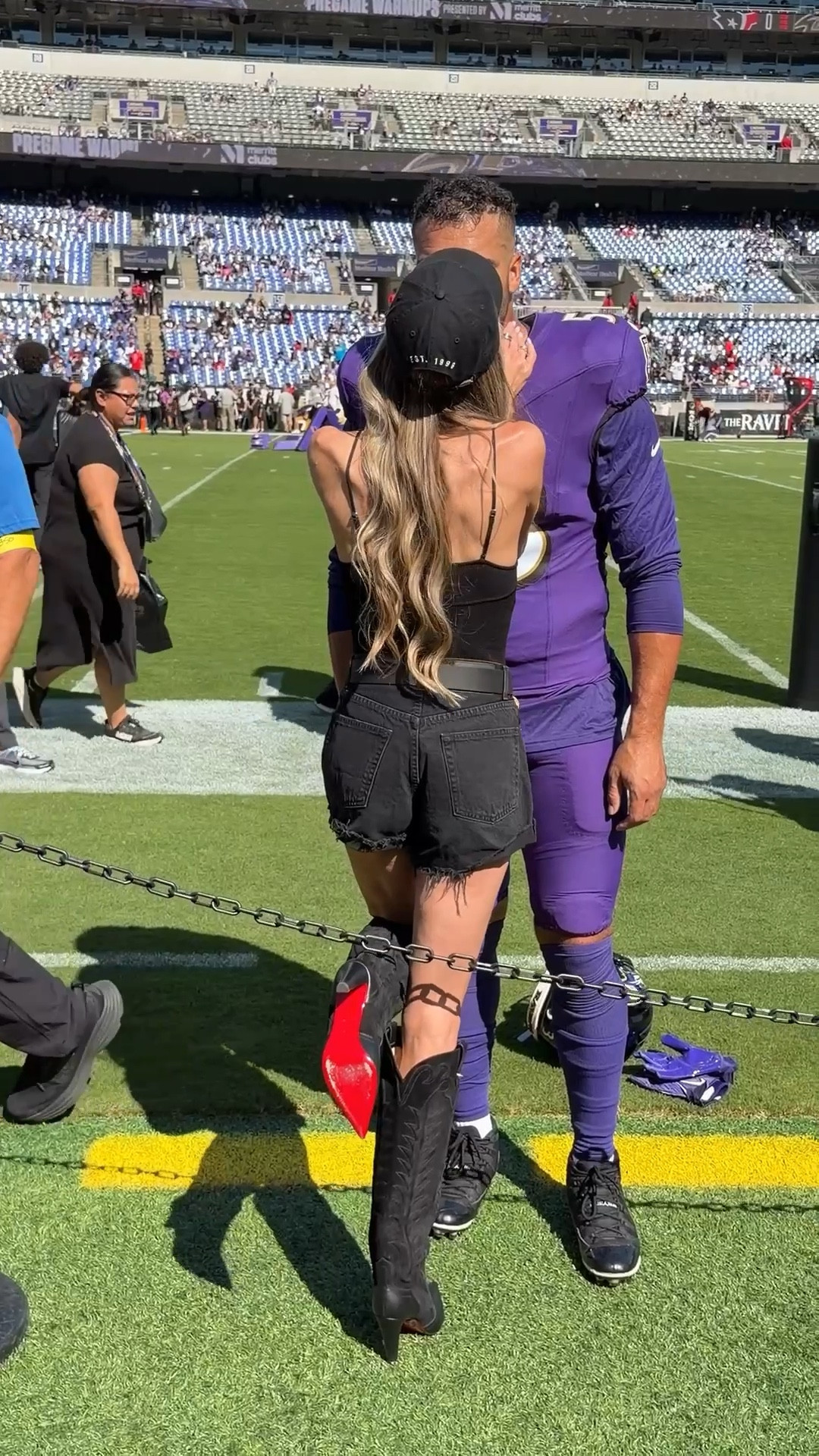 53 forevermore 💜🐦‍⬛  Black Ravens hat is from Fanatics, black corset body suit is Fleur du Mal, black cutoff denim shorts are Levi’s, western belt is Streets Ahead, oversized sunnies are from Amazon, purple bomber jacket is vintage St John from The Real Real, and western knee high heeled boots are Christian Louboutin 😍

#LTKShoeCrush #LTKStyleTip #LTKFindsUnder100