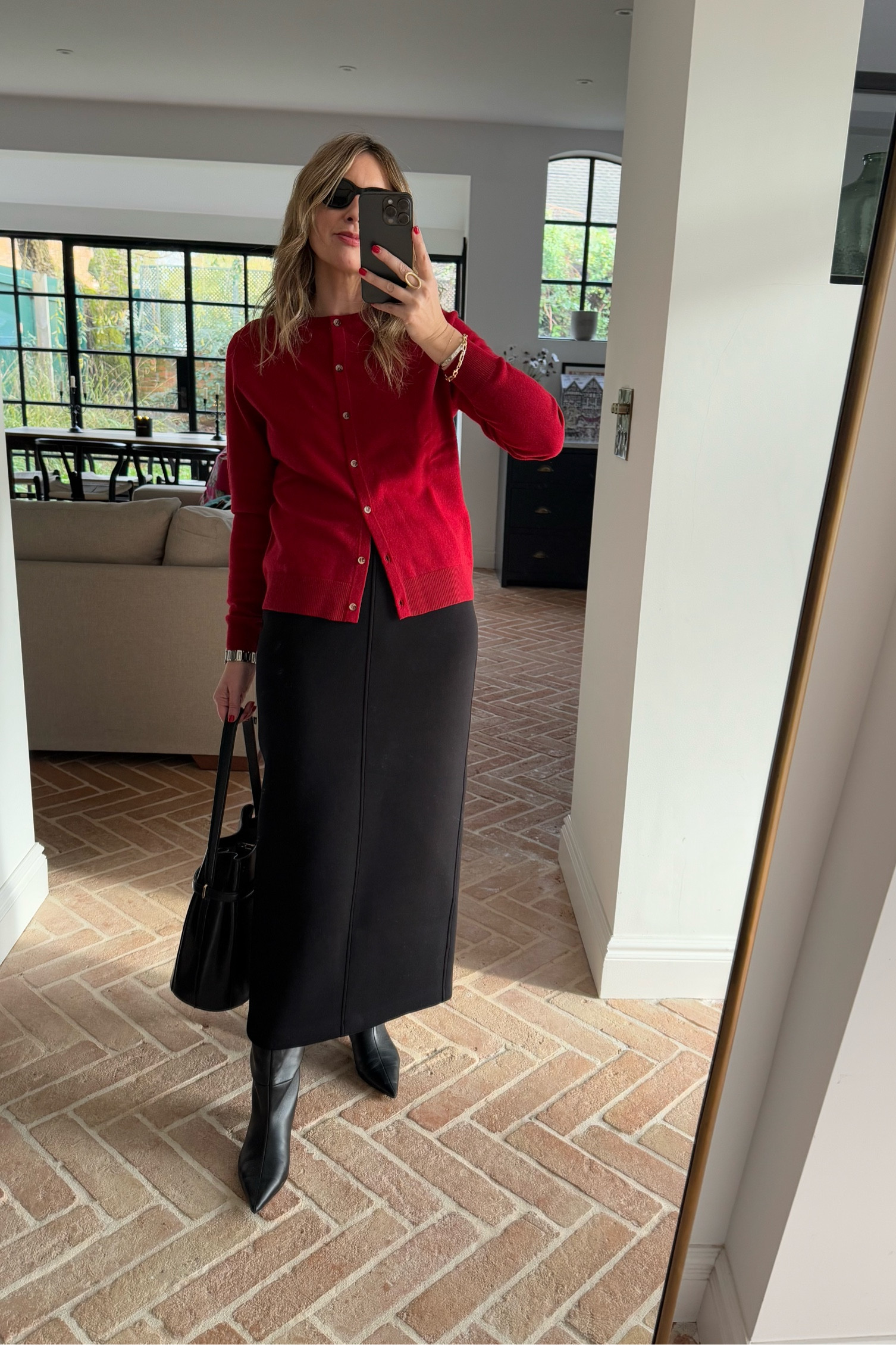 Red Cardigan + Scuba Skirt + Knee High Boots | Midi Skirt | Christmas Day Outfit | Lunch Outfit | Cashmere | Red Knit | Toteme Bag | Boots 

#LTKstyletip #LTKover50style #LTKeurope