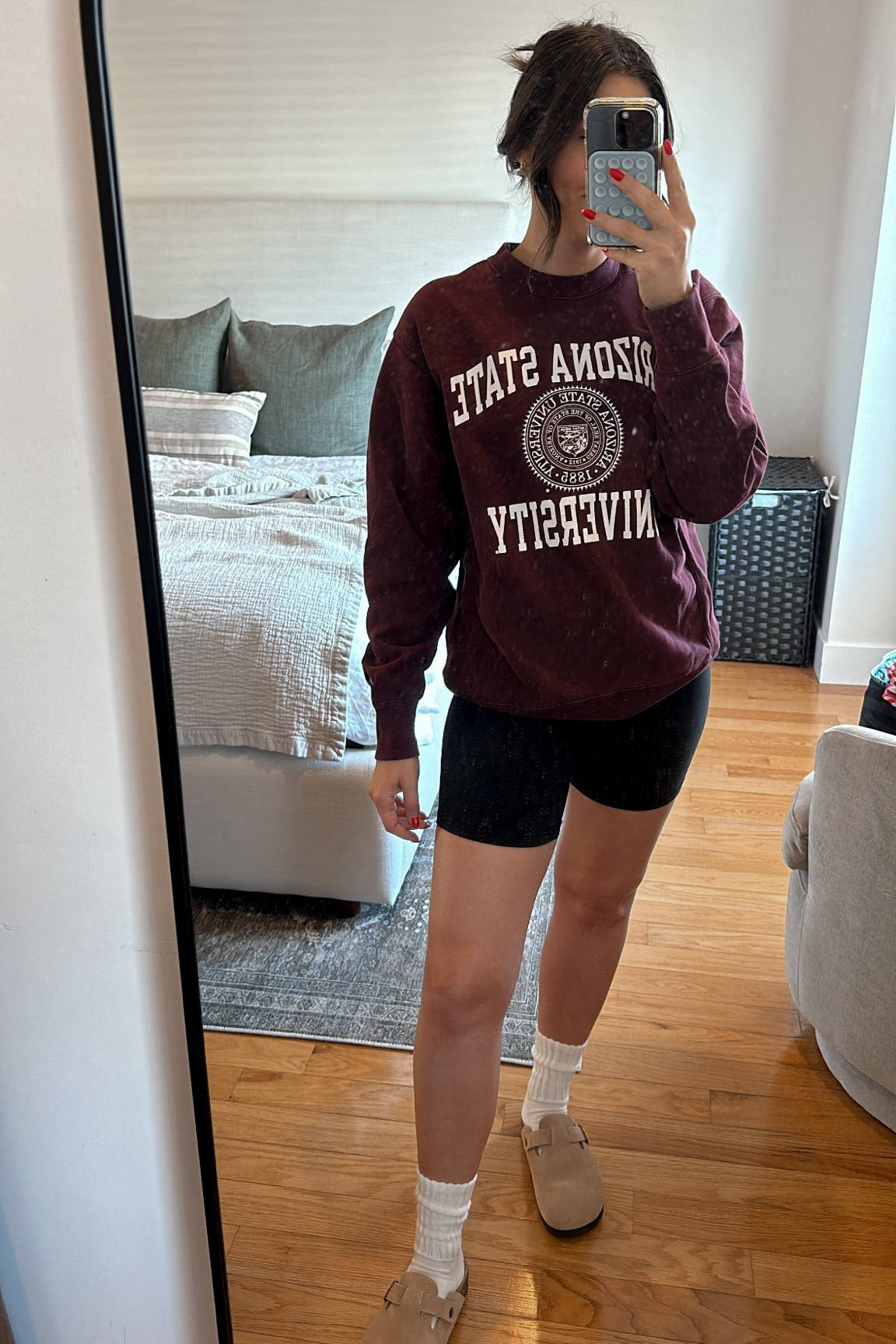 Pre fall outfit 🖤 it’s biker shorts, oversized sweatshirts and clogs season! These Amazon clogs are AMAZING Birkenstocks dupes. Found the perfect cozy crew socks for them too! 

#LTKFindsUnder50 #LTKSeasonal #LTKSaleAlert