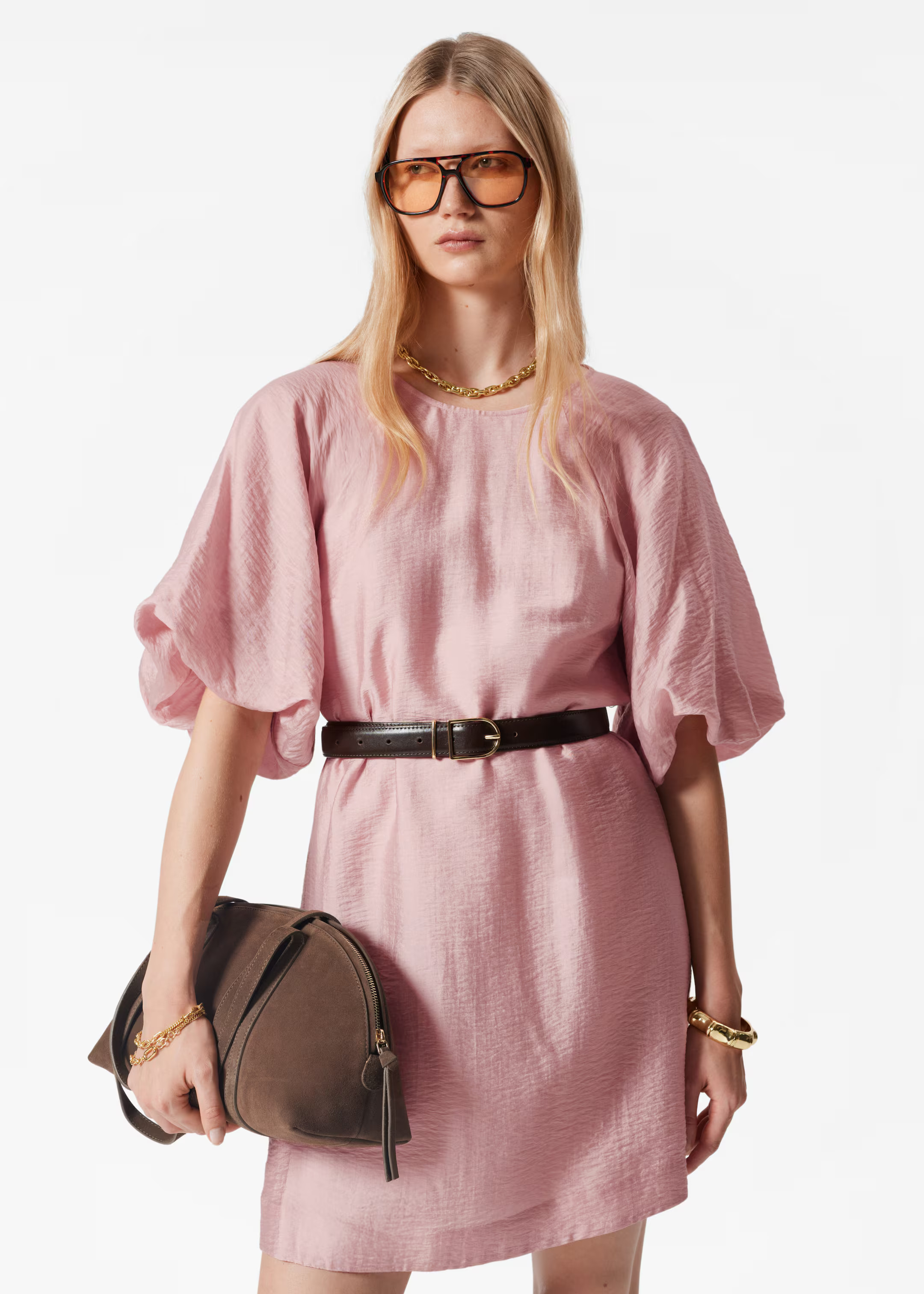 Mini dress designed with a round neck, short puff-sleeves, and a flowy silhouette featuring a bel... | & Other Stories - US