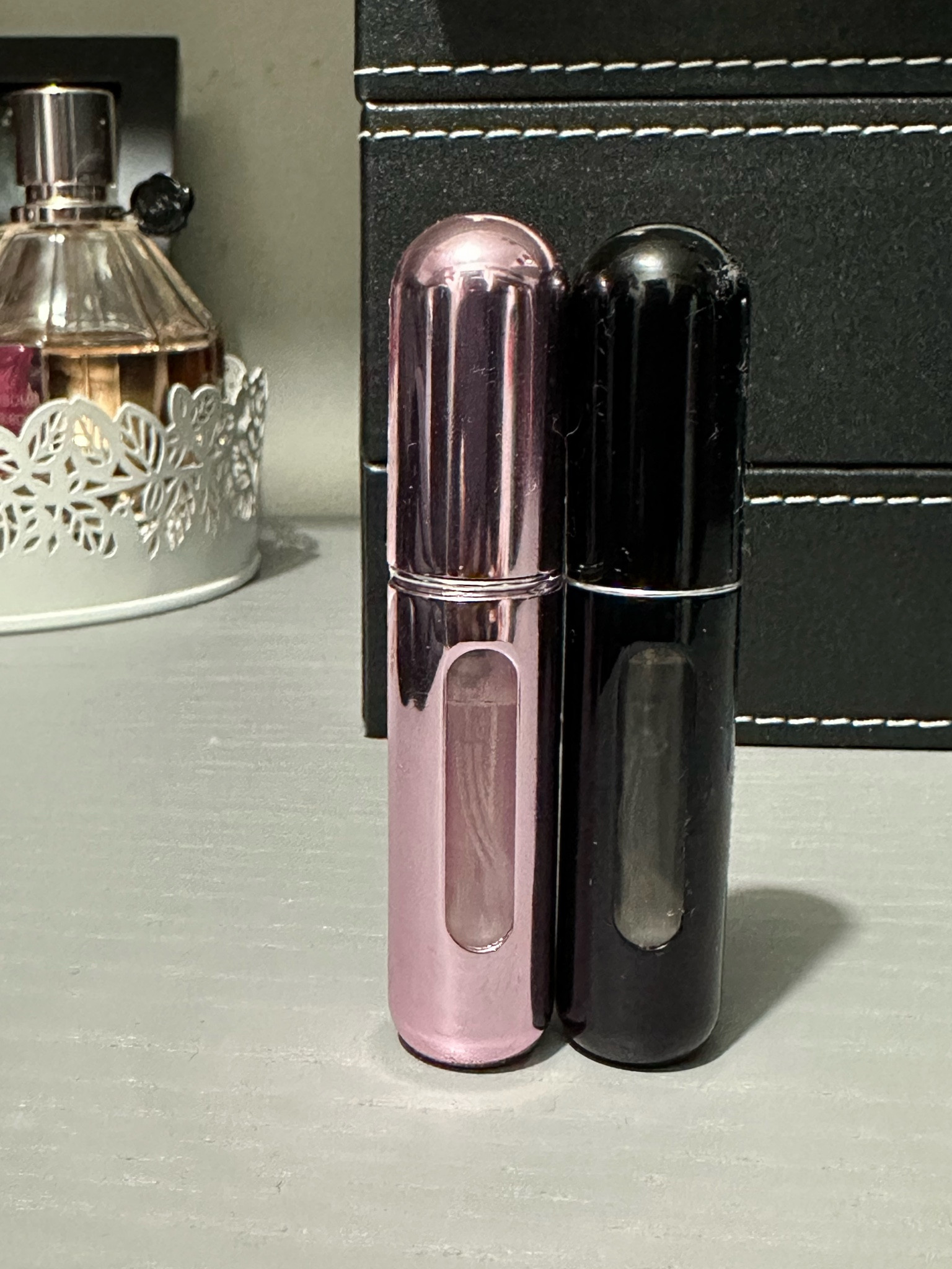 Refillable travel perfume bottles