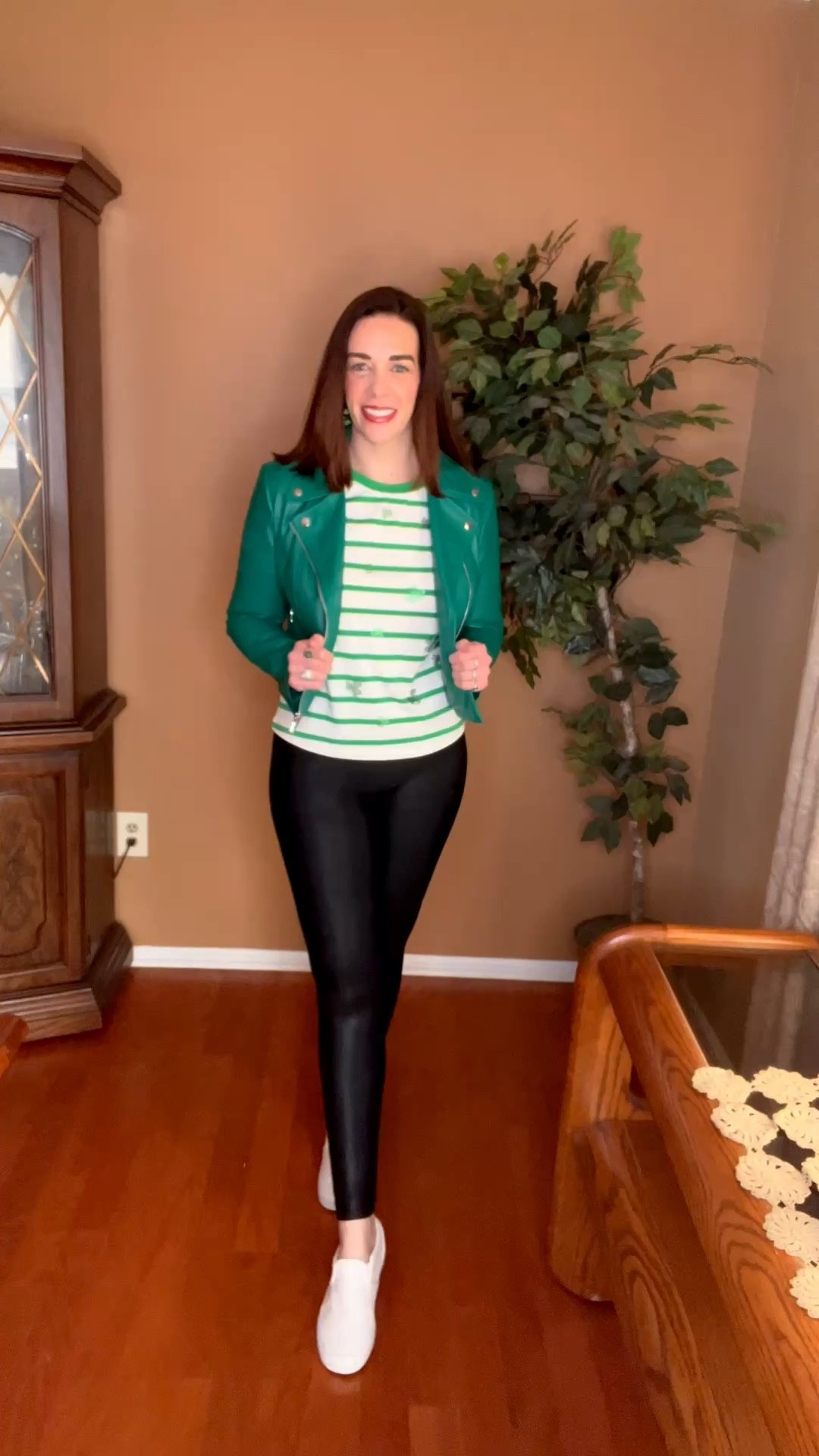 Green and white striped top (s). Green leather moto jacket (s). Black faux leather leggings (s). White slip on sneakers (8.5). #top #stripedtop #jacket #motojacket #leatherjacket #greenjacket #leggings #fauxleatherleggings #blackleggings #sneakers #sliponsneakers #whitesneakers #springoutfit 
spring outfits 2026 @TJ Maxx @Spanx @DSW @Target 

#LTKSeasonal #LTKootd