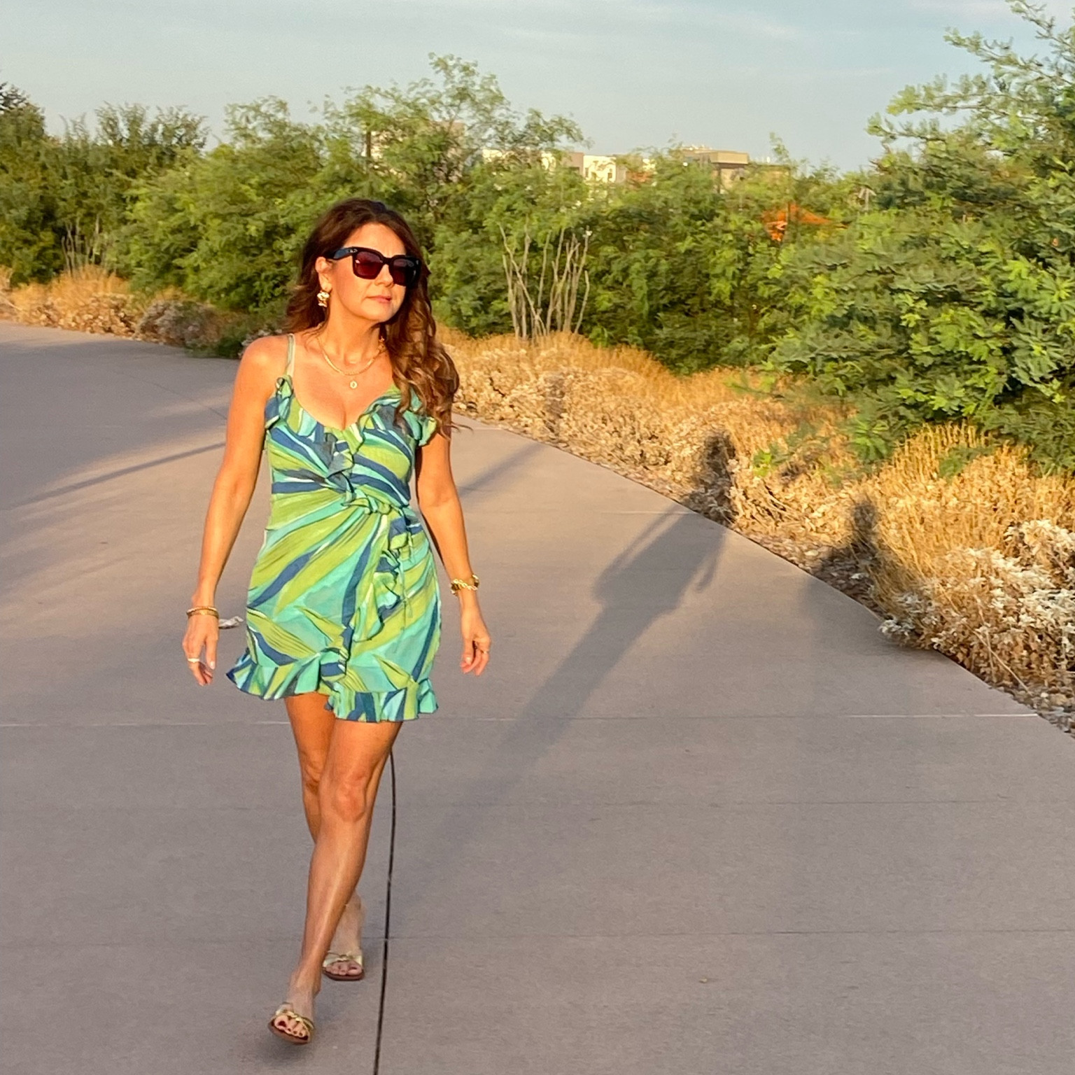 Mini dress wrap dress ruffle dress h&m green sandals heels date night summer vacation outfit concert 

#LTKstyletip #LTKunder50 #LTKFind