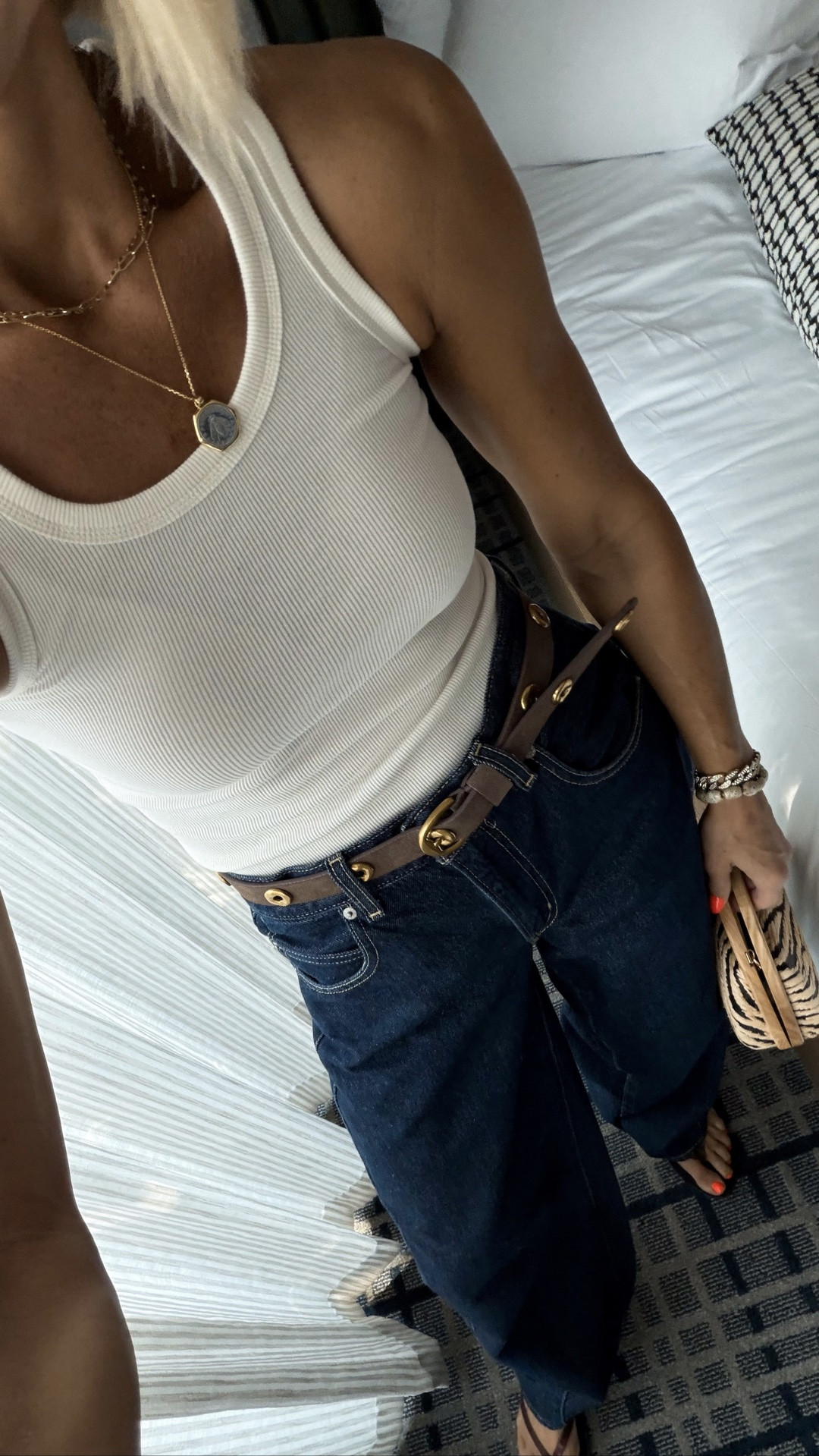 jeans + tank, always. 
Added some fun accessories to zhuzh it up! 
Size down in jeans and belt! Both run big.
Cutie zebra bag is on major sale!

#LTKCon #LTKOver40 #LTKSaleAlert