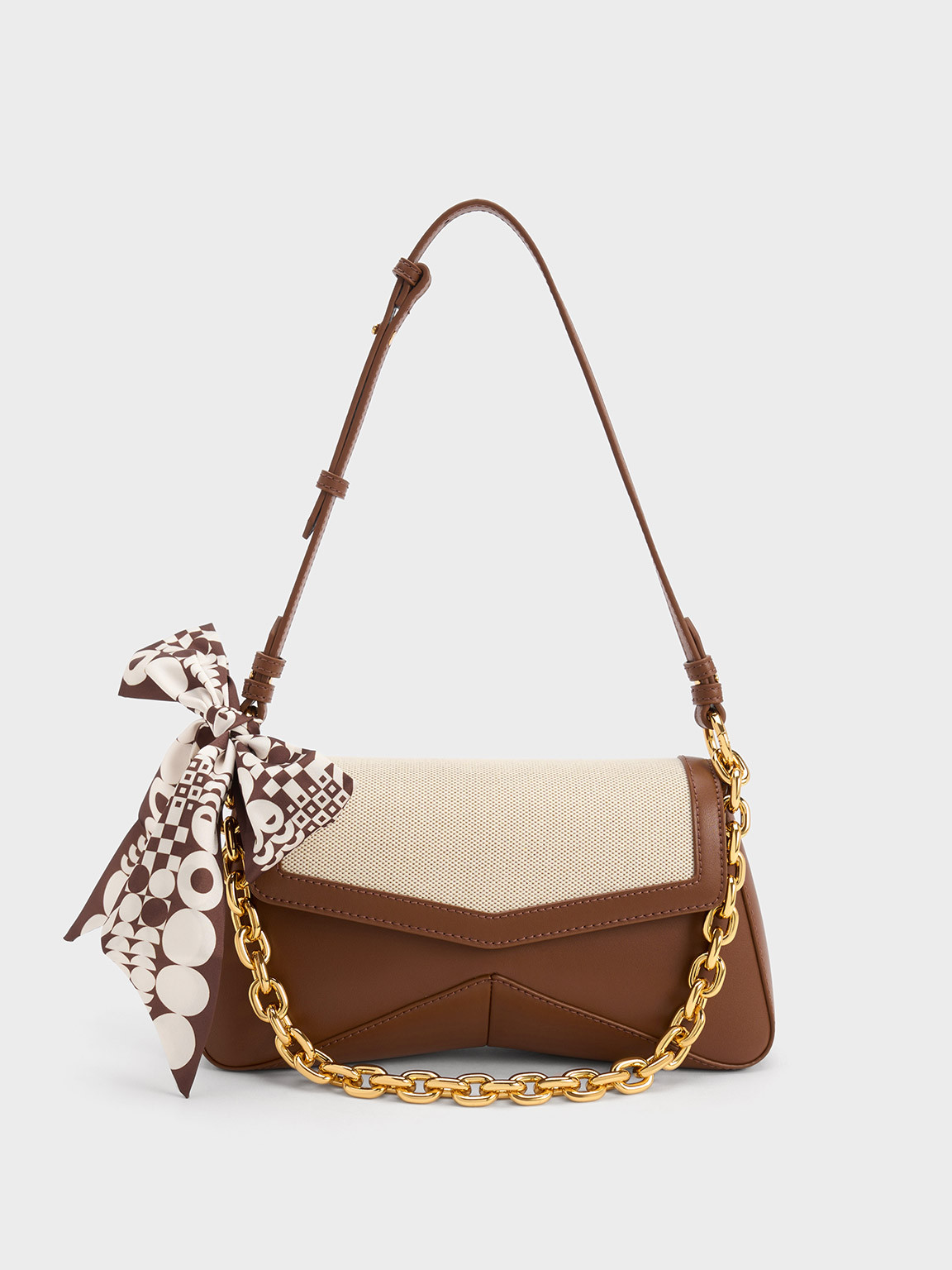 Arley Canvas Chain-Link Trapeze Bag
 - Chocolate | Charles & Keith UK