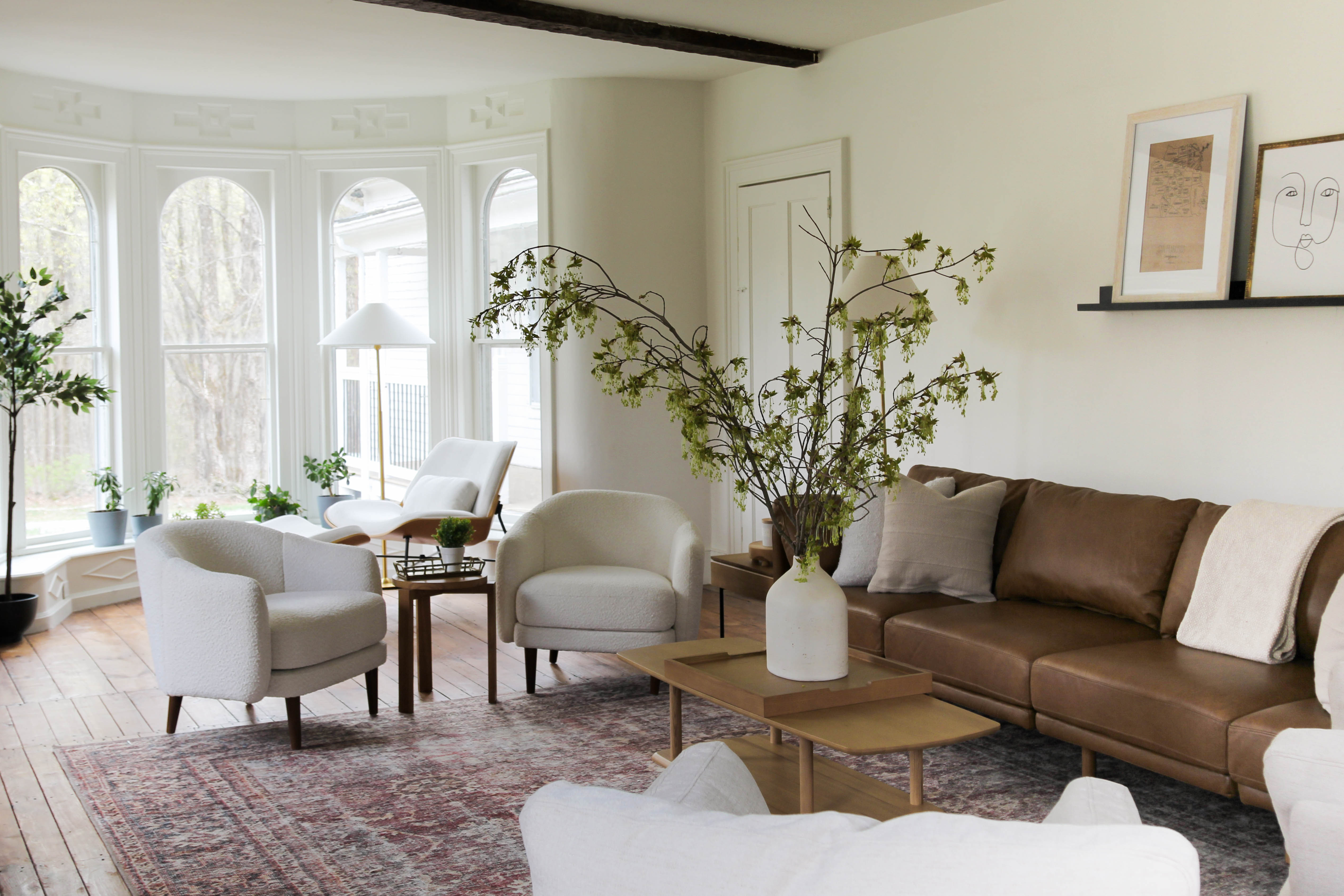 Leather, wood, and soft neutrals layered throughout this living room.
Linked exact and similar pieces below. 

 #livingroomdesign #neutralhome #interiordesign #LTKHome #LTKSaleAlert