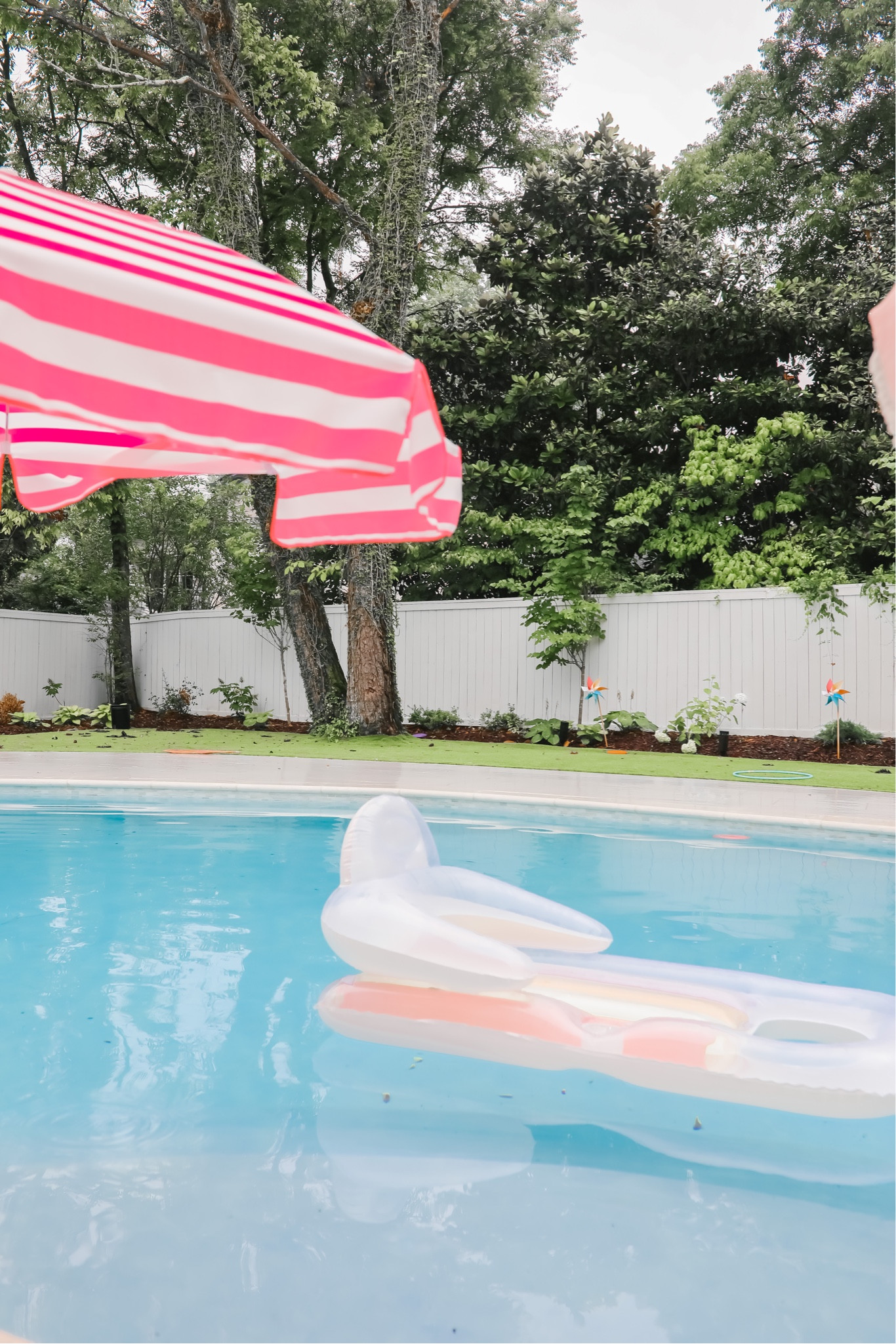 If you’re looking for some cute pool/outdoor decor, look no further! This super fun, pink striped umbrella is the cutest and really affordable! And they’re super comfortable float is under $10 and I love the muted colors. 