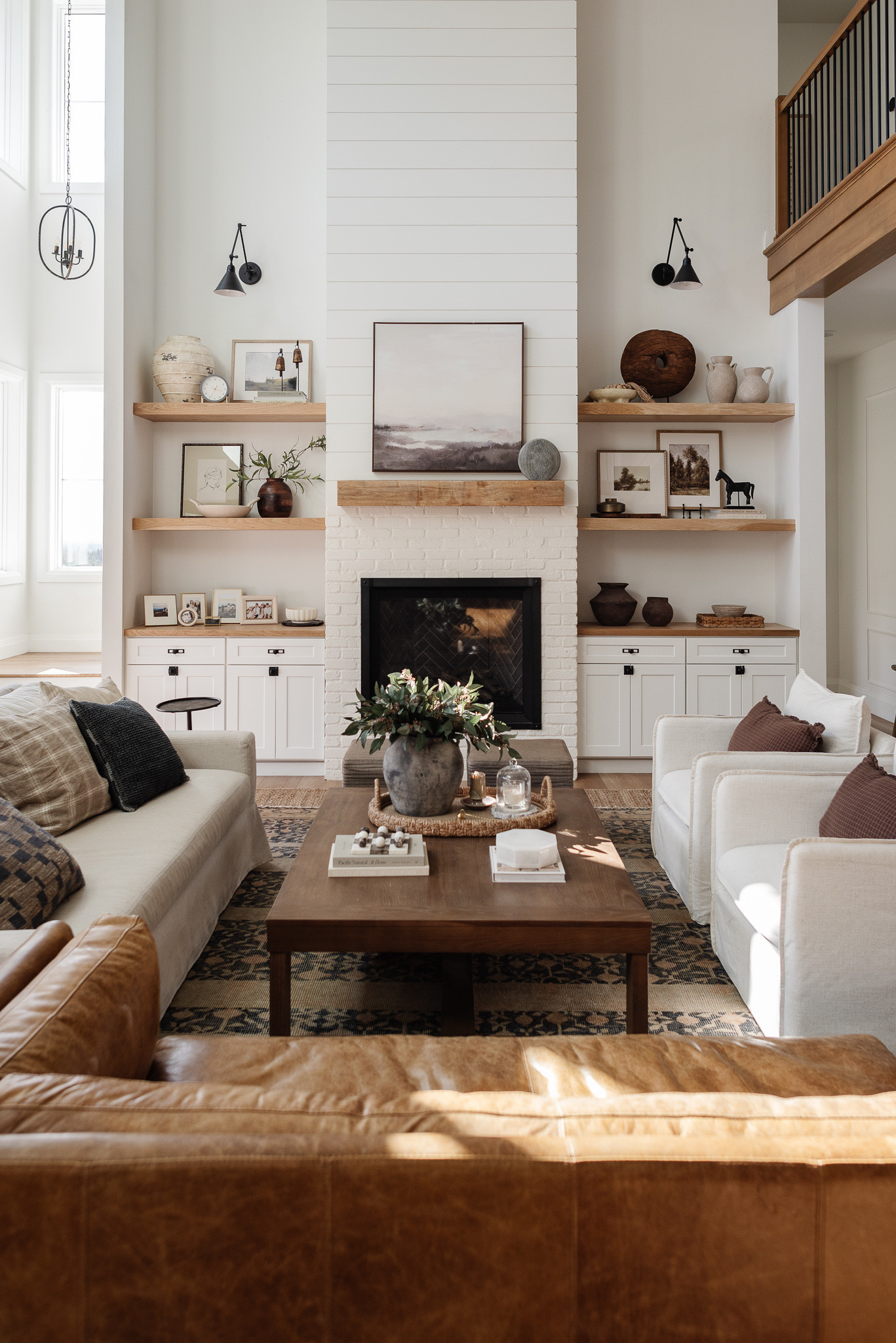 Cozy and classic living room details!

Living room, open shelves, coffee table decor, neutral living room, living room furniture, accent chairs, shelf decor, built ins, McGee and co decor

#LTKHome