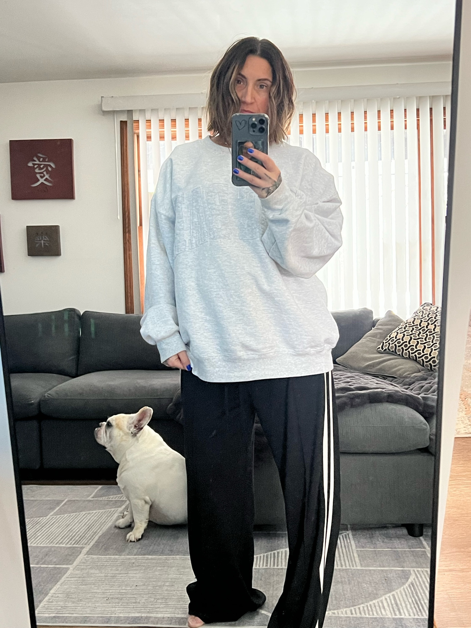 The aerie bottoms are lightweight , high-waisted stretchy wide leg track pants . It also has a draw strong . The crewneck is from the__bar , the heritage collection . The blanket of course is from Comfrt . 

I’m 5.4” 138lbs
Small in the bottoms
XL in the top for a more oversized fit 
The blanket is shade thunder 

#LTKWatchNow #LTKMostLoved