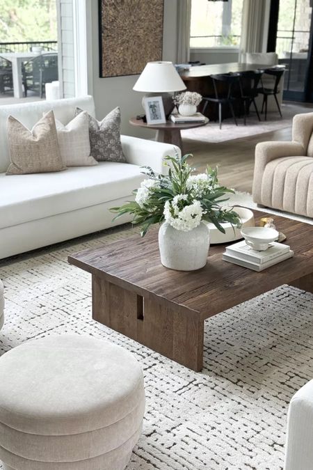 Such a beautiful living room styling - the perfect blend of neutral and minimalist!

Home  home decor  home finds  home favorites  modern home  neutral home  coffee table styling  faux florals  living room inspo

#LTKhome #LTKSeasonal