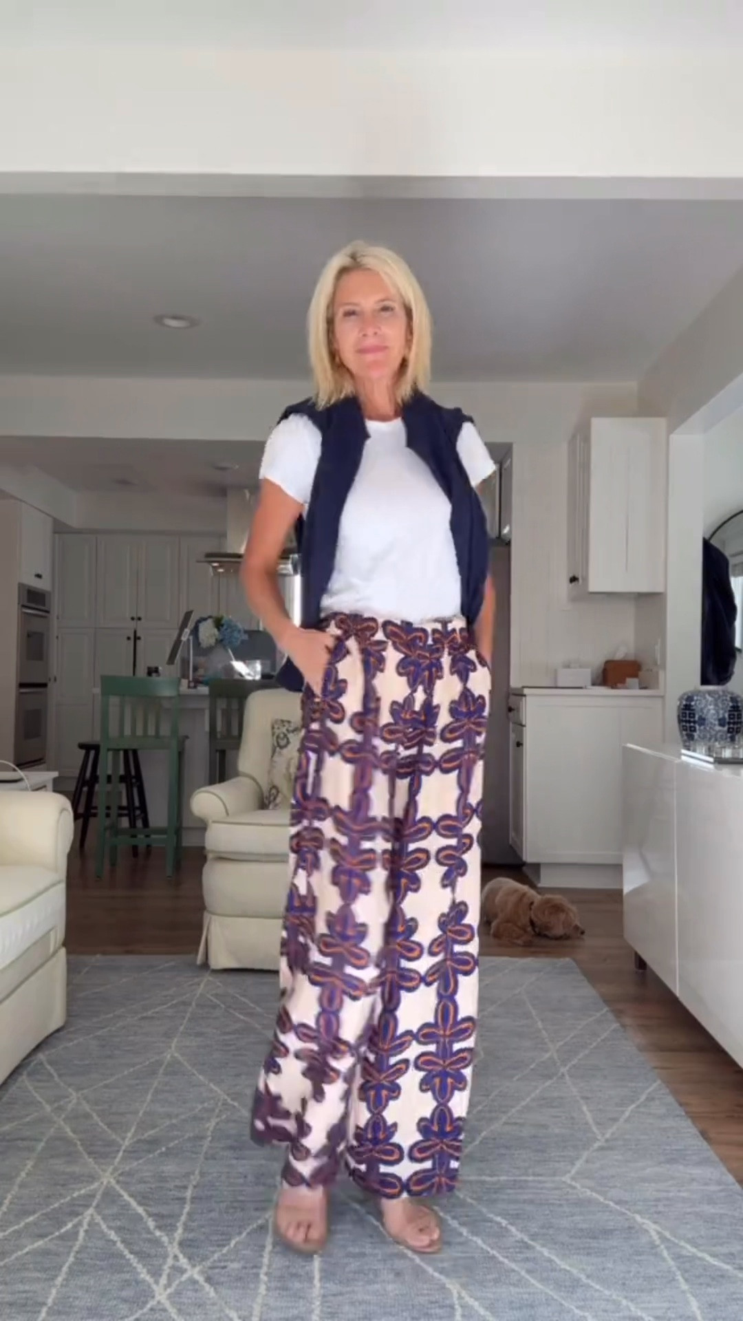 These printed wide-leg pants are such a fun way to add personality to an everyday outfit! I paired them with a simple white tee and a navy sweater draped over my shoulders for an effortless look that's perfect for travel, lunch with friends, or casual summer days. Comfortable, polished, and so easy to wear!

❤️ Heart = Support my posts
📌 Save = Get sale & restock alerts
🛍️ Follow me on LTK for more effortless style.

#LTKootd #LTKSeasonal #LTKOver40