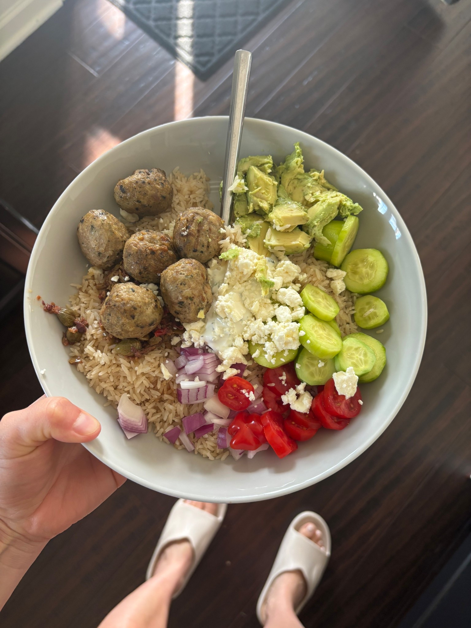 When life gets busy, the "assembly bowl" is my go-to. This Greek-inspired bowl is packed with healthy fats, fiber, and a secret mineral boost. By swapping plain water for bone broth when cooking the rice, you’re adding collagen and gut-healing amino acids without any extra effort.

It’s colorful, satisfying, and takes less than 15 minutes to pull together if you have your basics prepped!

The Recipe
• The Base: White rice cooked in bone broth (i use my instant pot to cook rice perfectly every time).
• The Protein: Chicken meatballs (these are premade).
• The Fresh Crunch: Diced cucumbers, cherry tomatoes, and red onion.
• The Healthy Fats: Sliced avocado and a scoop of olive tapenade.
• The Zest: A generous dollop of tzatziki dip and crumbled feta cheese.
Method: Scoop your warm bone-broth rice into a bowl, top with the meatballs, and arrange your fresh veggies and fats around the edges. Top with tzatziki and feta, and enjoy!

#HealthyLunchIdeas #BoneBrothBenefits #GreekBowl #CleanEating #EasyRecipes 
Springmealideas

#LTKmomlife #LTKvlog #LTKfoodie