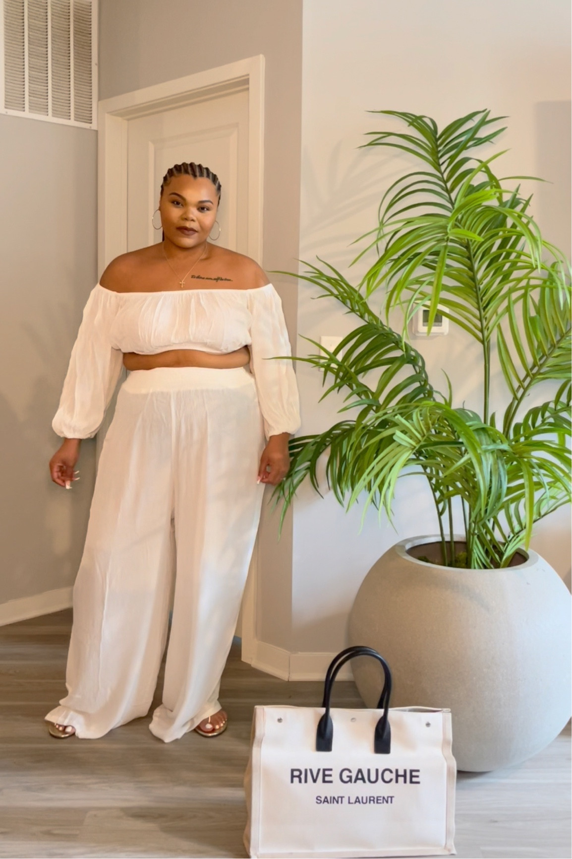 Plus size white two piece resort wear. This vacation outfit is it! Pair this with Tory Burch sandals and you’ll instantly give baddie vibes! The wide leg pants are perfect for the spring! The off the shoulder top is that girl!

#LTKstyletip #LTKcurves #LTKSeasonal