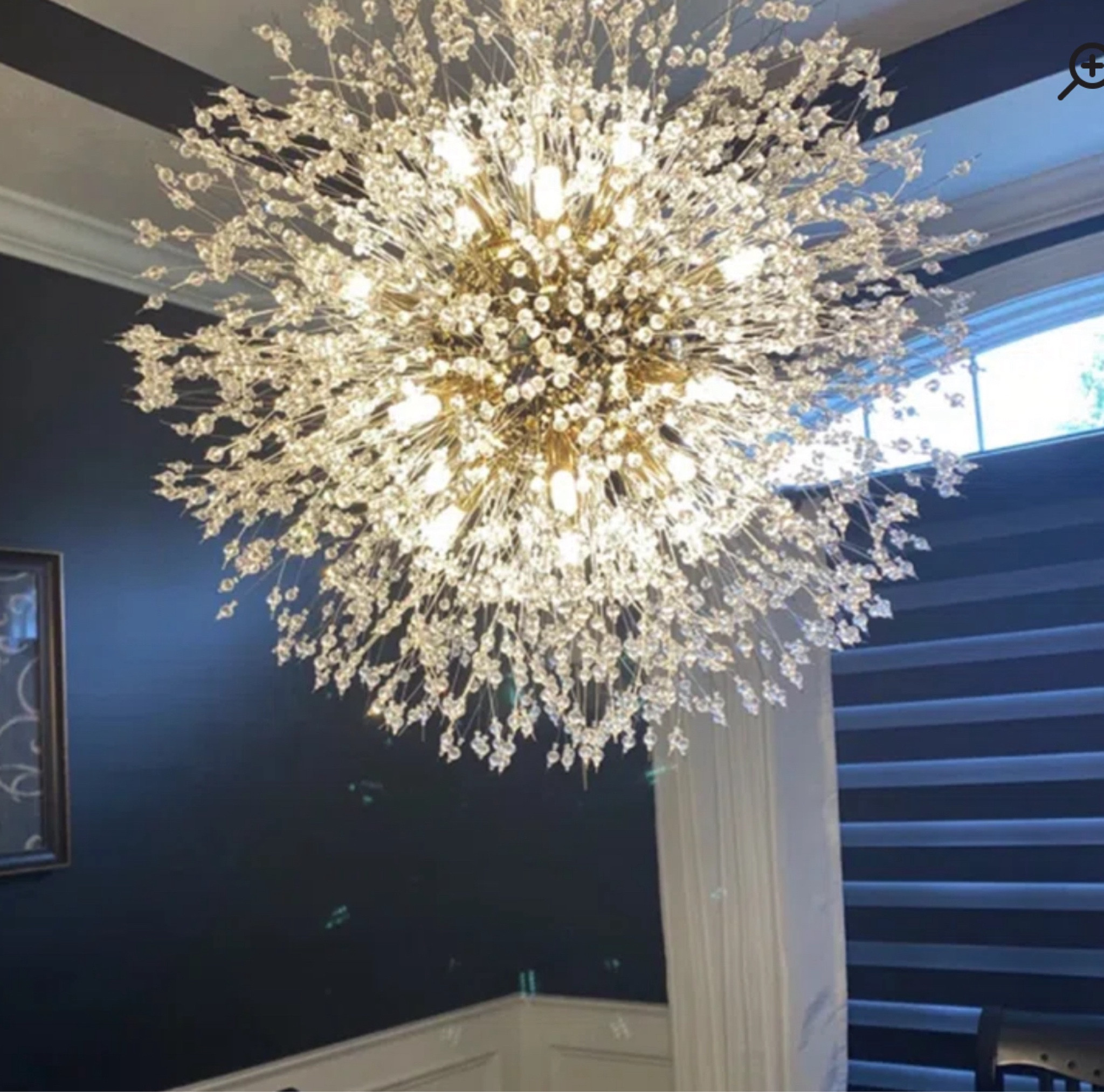 Wanted one super fun & whimsical lighting element. Adding over master custom vanity. Accent wall is black with black lettered countertop and silvered grey oversized drawers. 