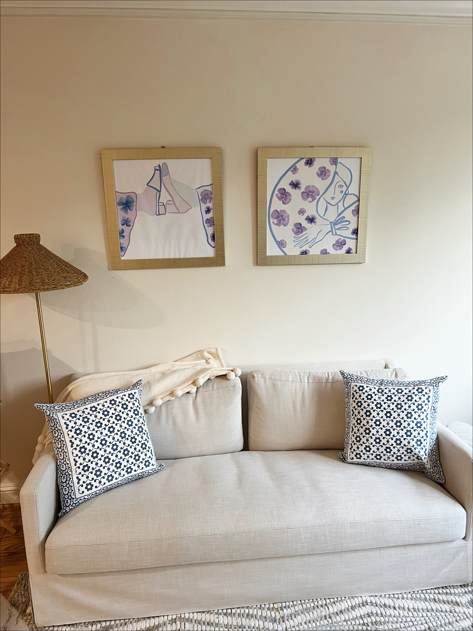 Annie b 🤍 home finds 🤍 apartment finds 🤍 cloud couch 🤍 couch under $1000 🤍 floral pillows 🤍 grey couch 🤍 rattan bamboo standing lamp 🤍 grand millennial apartment decor 🤍 first apartment decor 

#LTKSeasonal #LTKhome #LTKunder100