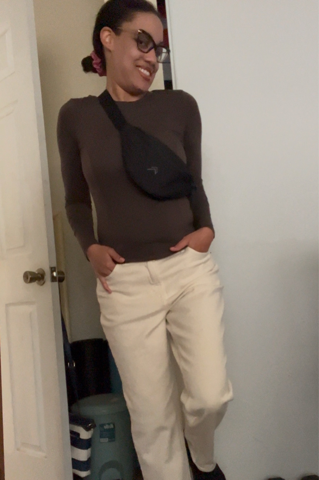 Mellow soft long sleeve in deep taupe in size medium 
Tan jeans size 4
Classic canvas bum bag in black


#LTKStyleTip #LTKItBag #LTKFindsUnder50