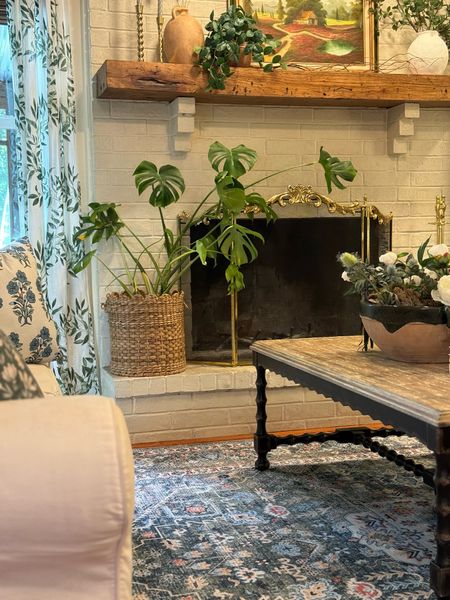 Washable vintage rug, rectangle coffee table, spindle leg coffee table, large coffee table, botanical curtains, semi sheer linen curtains, slipcover couch, throw pillows

#LTKhome #LTKfindsunder100 #LTKSeasonal