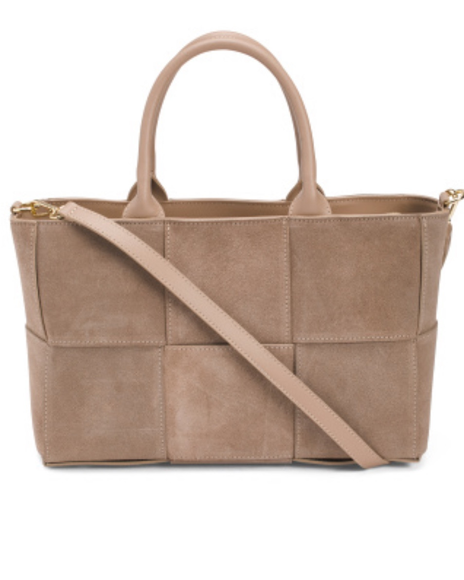 ISADORA
Made In Italy Suede Large Woven Satchel

Reminded me so much of the Bottega Arco Tote!  

Color: Taupe 

 Product Details
-
woven design, dual carry handles, adjustable detachable shoulder strap, convertible style, metal feet, dual compartment design
17in W x 9in H
zip closure
2 interior slip pockets, 1 interior zip pocket, 1 interior organizational zip pocket
suede
imported, made in Italy style #:4000345235

#LTKFindsUnder100 #LTKSeasonal #LTKItBag