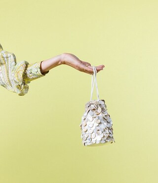 x Amanda Jones Vaughan Roxie Disc Shell Drawstring Clutch | Dillard's