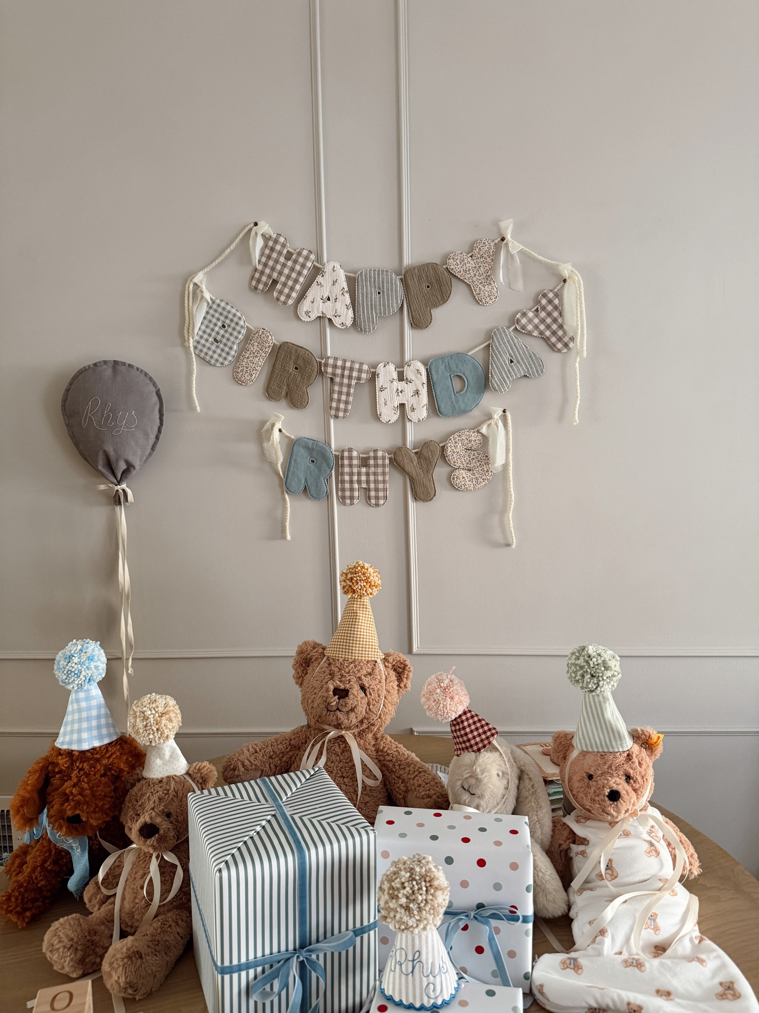 I had this handmade happy birthday sign made for Rhys's first birthday and it came out so cute! I'll hang it for his birthday every year! The party hats for his stuffies and the fabric balloon will be used year after year as well! First birthday celebration! 

#LTKBaby