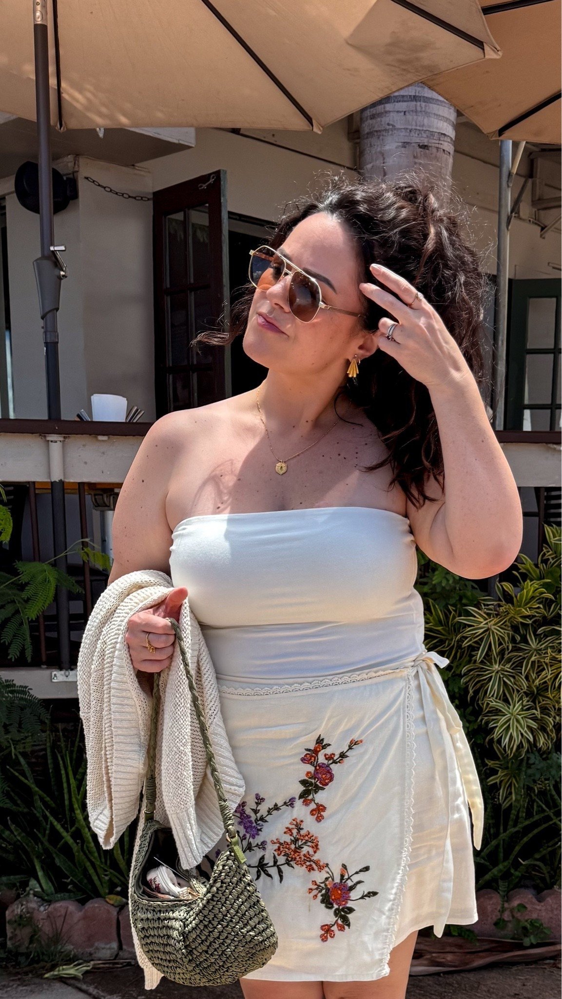 midsize vacation outfit, hawaii outfit. 

•wearing a xl in the tube top
•i am typically a 36dd in bras wearing a 38d in my fave strapless bra. 
•beach cardigan large 
•this embroidered wrap skirt is old i linked similar options. 
fave flip flops 
•green straw bag

#LTKOver40 #LTKootd #LTKMidsize