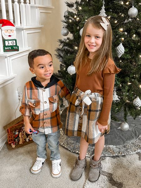 Cousins matching in plaid! ✨ Brynn’s plaid skirt is only $16 with the top. Her camel ruffle top is on sale for $3.99! Shipping comes within a week from SheIn! Brynn’s boots are from DSW and so comfy! Linked Braxton’s cute Fall look too! 

#LTKfamily #LTKstyletip #LTKunder50