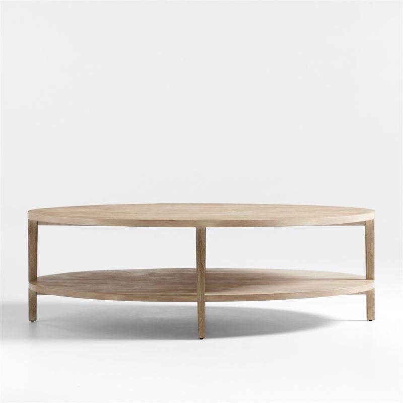 Clairemont Oval Natural 60" Coffee Table with Shelf + Reviews | Crate & Barrel | Crate & Barrel