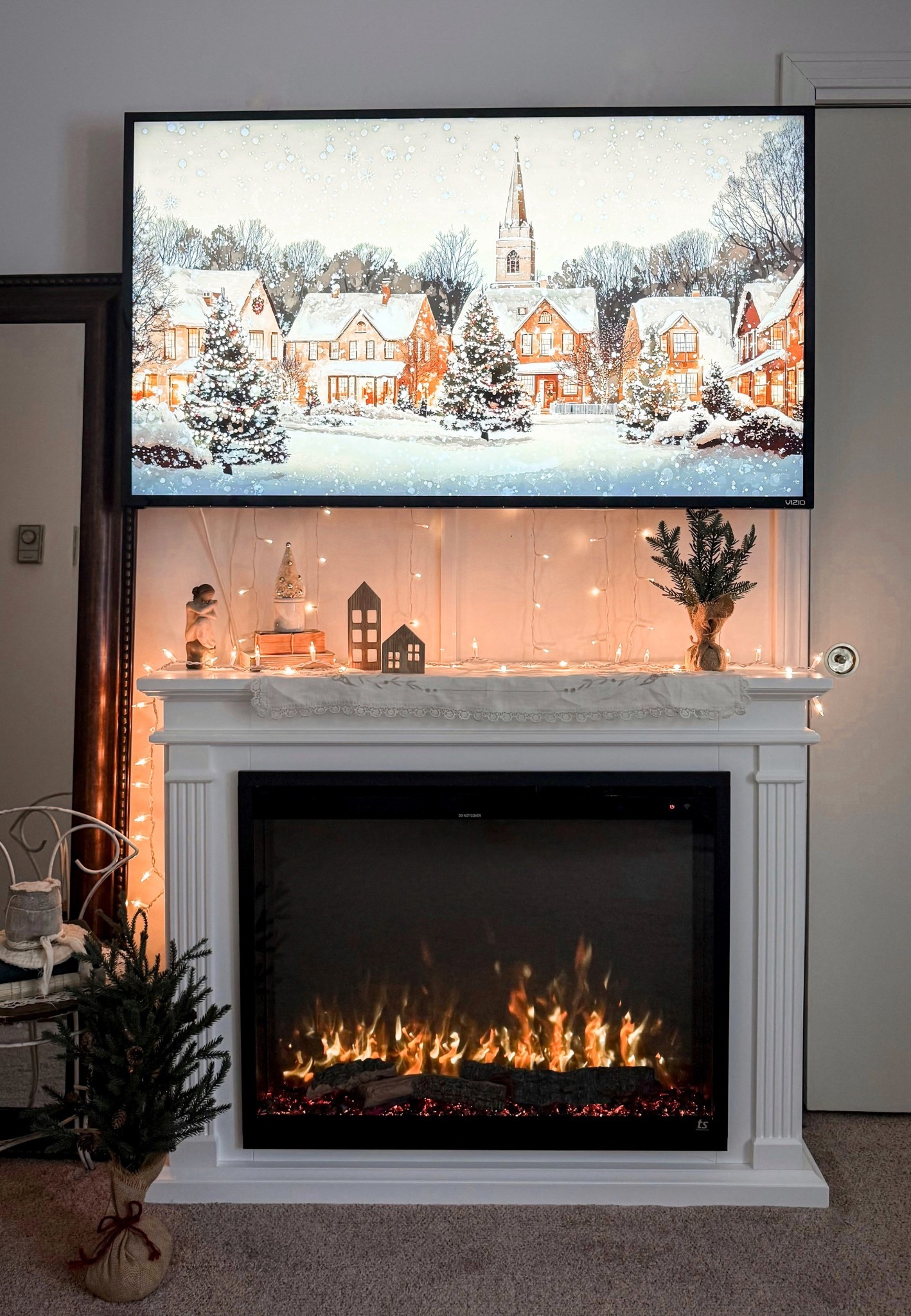 This smart electric fireplace with an encased mantle is the perfect bedroom upgrade. Setup is simple: assemble the mantle, attach the insert, and plug into any standard 120v outlet. The Touchstone Fireplug™ insert features a slim profile, deeper viewing area, enhanced flame technology, crushed glass crystals, driftwood, and a built-in crackle speaker for realistic sound.

Fully smart-home enabled — works with Alexa, Google, smartphone app, remote, or onboard controls. You can customize 6 flame colors, 13 ember bed colors, 13 down-light colors, 5 flame speeds, and adjustable intensity (78 total combinations). Includes two heat settings (750W/1500W) with thermostat control and an 8-hour timer. Can be plugged in or hardwired.

Perfect under a mounted TV, for bedrooms, living rooms, or any space where you want a custom-built look without construction.

#LTKHome #LTKFinds #ElectricFireplace #BedroomDecor #TouchstoneFireplace #HomeStyling #CottageStyle #NeutralHomeDesign

#LTKSeasonal #LTKHoliday #LTKHome