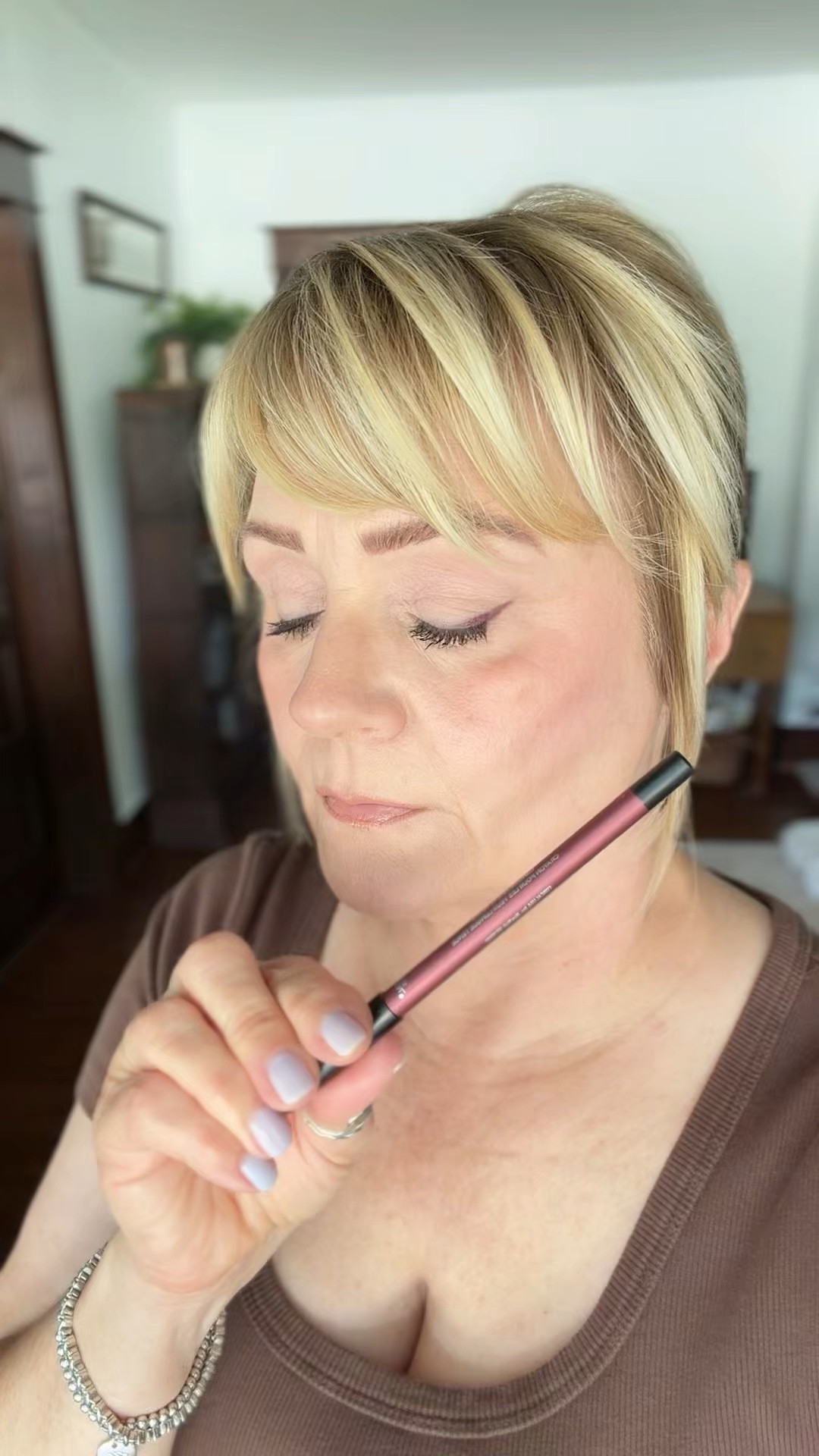 Love this pretty burgundy liner.  Great for brown, hazel or green eyes.  I used it in my water line also.

#LTKBeauty #LTKOver40