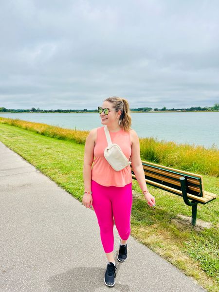 Colorful workout outfit: peach tank top and hot pink leggings! 

Go one size up in the tanks  