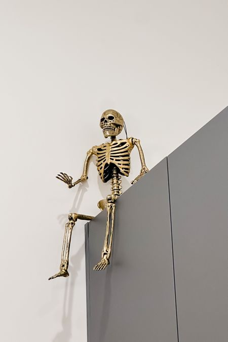 Added this gold posable skeleton to the top of our kitchen cabinets! This is the 24” size, also available in white. It also comes in a bigger 60” size in both colors! All under $50.

#LTKfindsunder50 #LTKHalloween #LTKSeasonal