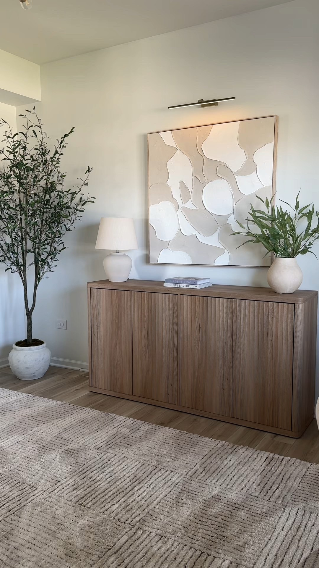 New sideboard for my home office! This stunning piece is affordable and provides a great amount of storage (color is natural oak). Picture light is the 20 inch size 

#LTKHome #LTKSaleAlert