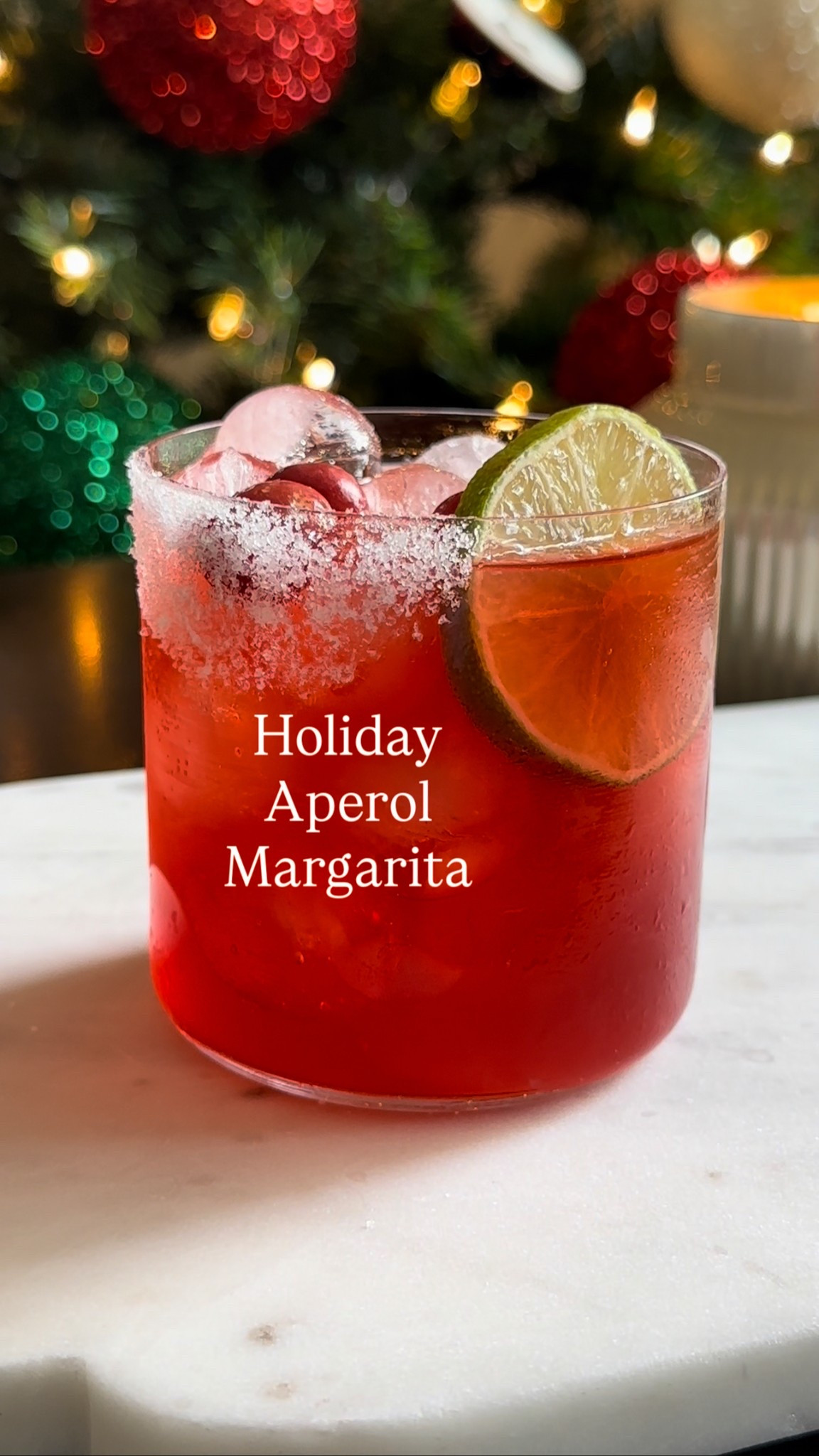 Holiday Aperol Margarita

Follow me on instagram and TikTok @drinkswithdanica for this recipe and more. Full recipe can also be found on Drinkswithdanica.com 
