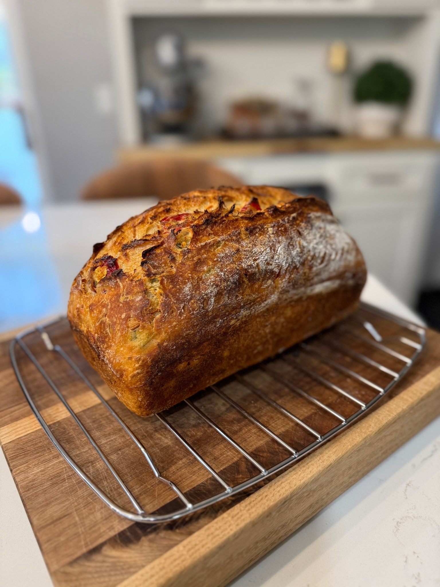  Beautiful bake this morning!

High hydration sourdough with Gruyère, Fresno chiles, and jalapeños. Baked in a loaf pan for slicing!

#LTKfoodie #LTKdayinmylife #LTKvlog