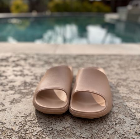 These Target slides are just $15 and I’ll be living in them all summer. They come in black and lavender as well. 

#LTKshoecrush #LTKswim