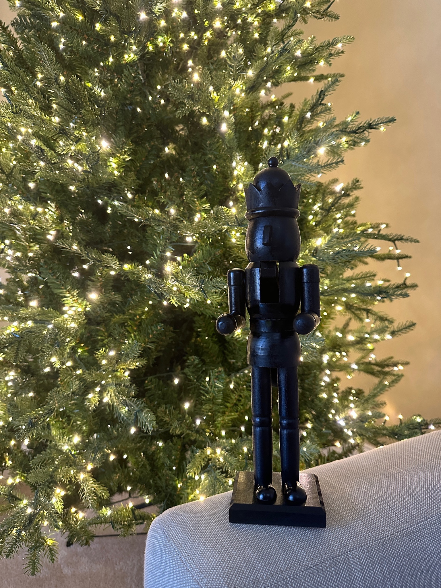 This simple DIY Christmas decor project transformed affordable wooden nutcrackers into a modern designer inspired nutcracker. 

I started with a wood unfinished nutcracker, removed the pole he was holding, and finished with a black spray paint...it's that easy! 

Holiday decor ideas // Christmas decor // nutcracker // cb2 look for less // crate and barrel inspired // twinkle Christmas tree 

#LTKhome #LTKSeasonal #LTKHoliday