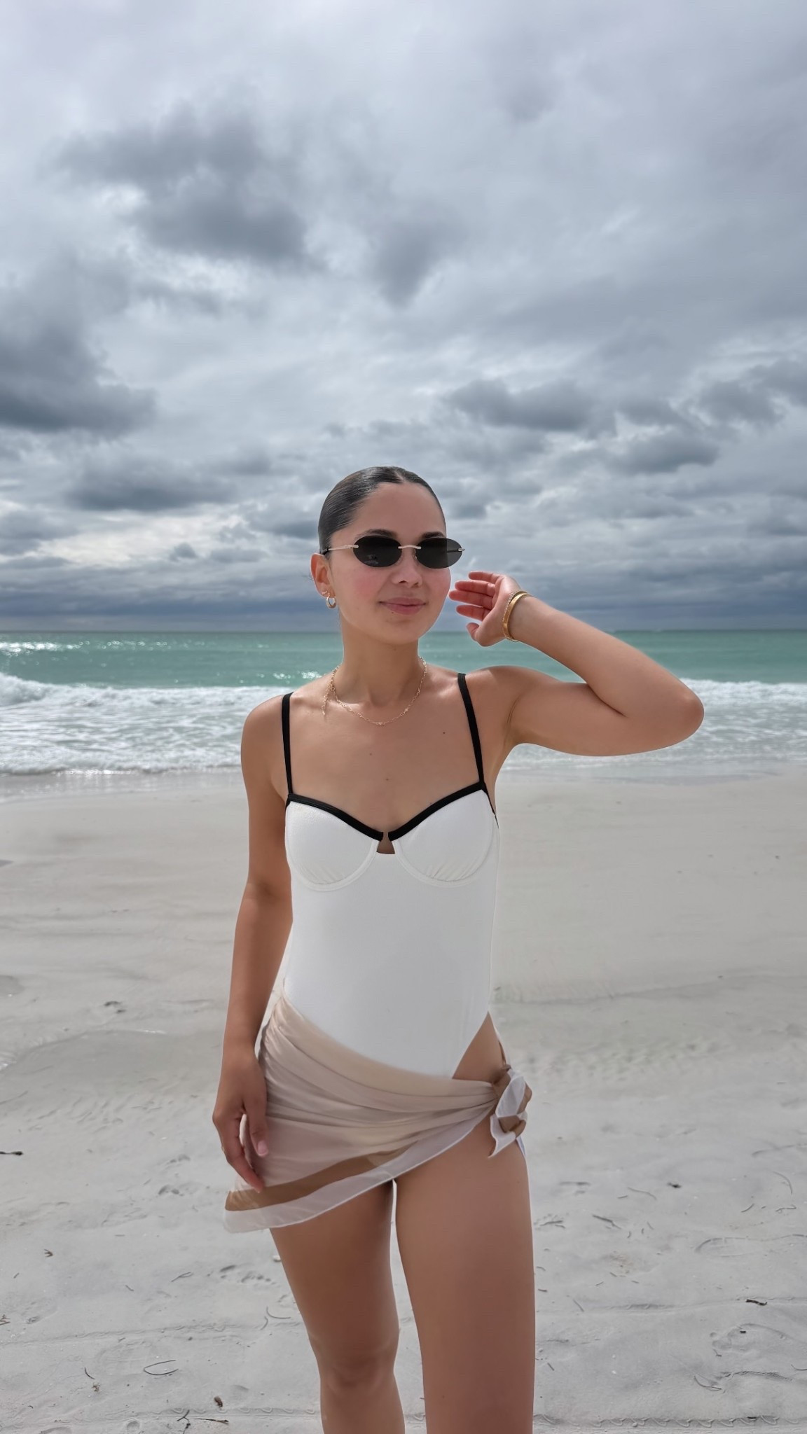 Wearing small swimsuit 