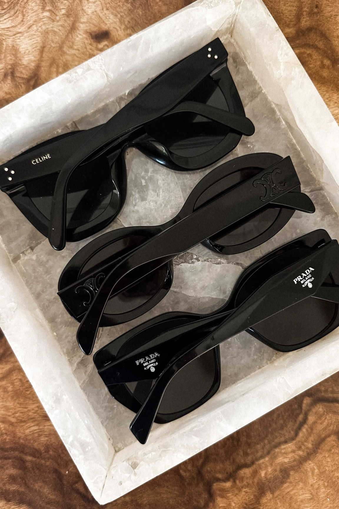 First up are my favorite and most worn pair of sunglasses. The Celine special fit cat eye sunglasses. Ive had these since 2018 and they are my signature pair. Super flattering.

Next are a newer pair, also Celine. The Triomphe oval sunglasses with smoke hardware. I was hesitant to try this shape, but quickly they have become a great modern update and go-to.

Last are the newest pair by Prada. These rectangular oversized sunglasses are a fun play on my signature pair. I love the angular shape and cannot wait to wear into the fall season.
#sunglasses #nordstrom #nordstrompartner 

#LTKStyleTip #LTKOver40