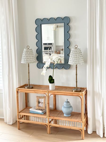 Love this $15 faux orchid from Target! 

Grandmillennial, Grandmillennial style, Grandmillennial decor, coastal Grandmillennial, faux orchid, scallop mirror, rattan console, blue ginger jar 

#LTKstyletip #LTKhome