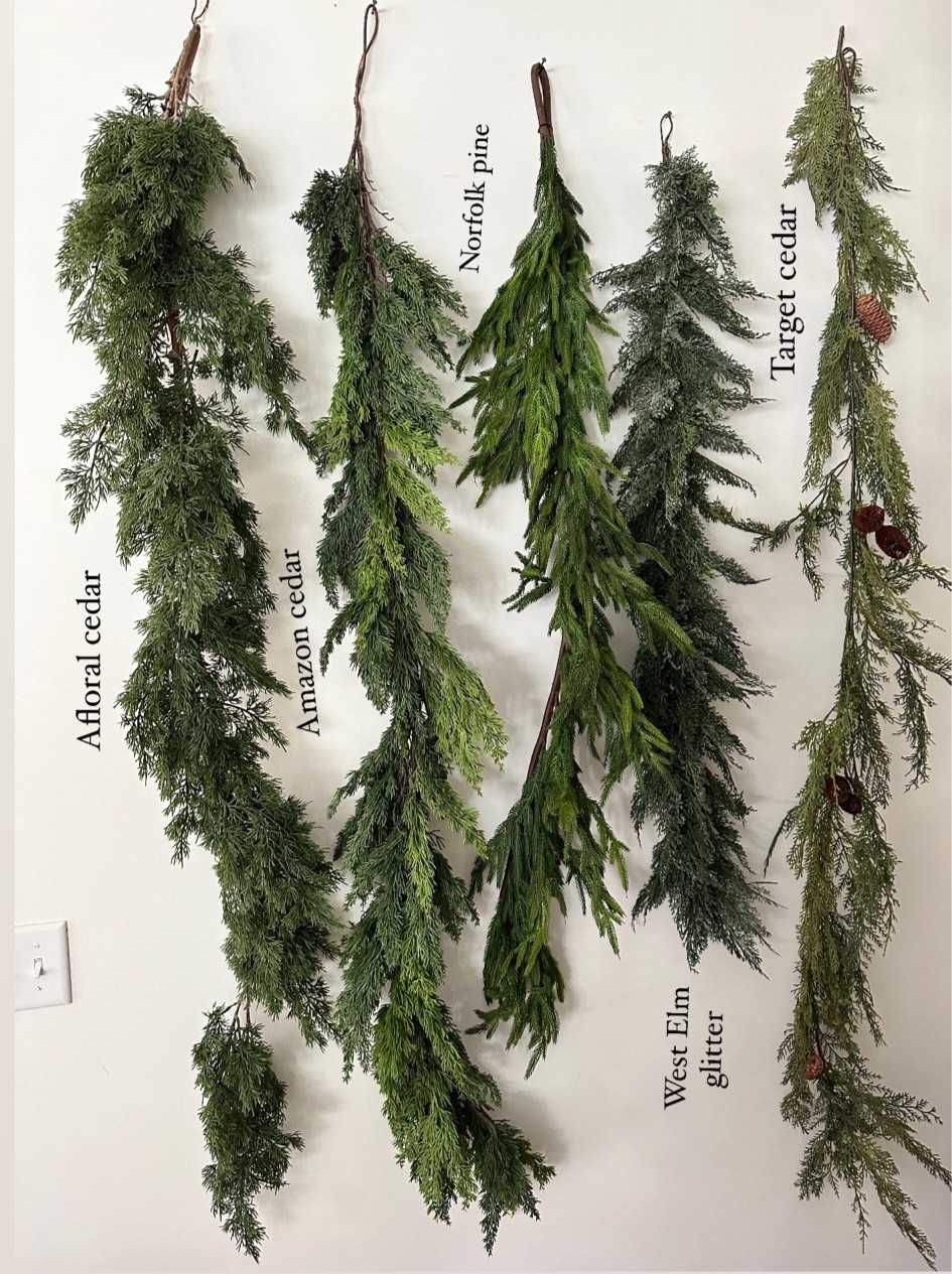 Sneak peek at this year’s garland breakdown! I am feeling cedar this year. Here are 5 different options from 5 different retailers. This Amazon cedar (second from left) is gorgeous! High-quality to the touch, too and a better price point than the Afloral cedar. Garland always sells out, so shop it now in October while it’s still available. ❤️

#LTKSeasonal #LTKHoliday #LTKHome