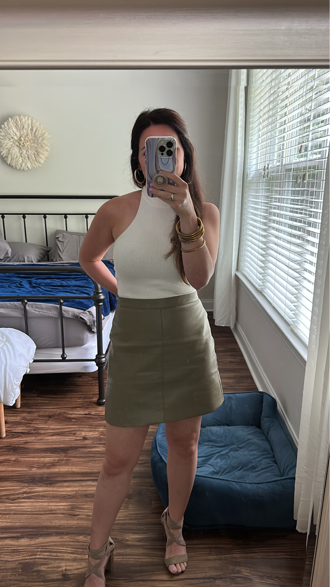 Ivory sweater knit turtleneck bodysuit
Olive green faux leather skirt
Suede taupe strappy heels
Work ootd
Abercrombie amazon 

#LTKworkwear #LTKfindsunder50