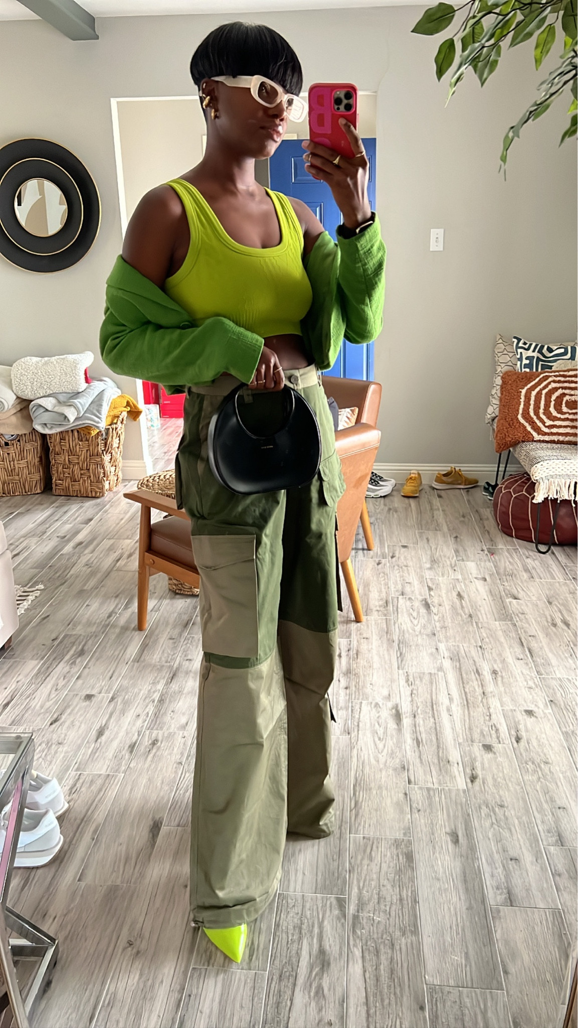 Oversized green cargo pants, black mini purse, neon green pumps, green cropped blazer and gold ear cuffs  

#LTKunder100 #LTKitbag