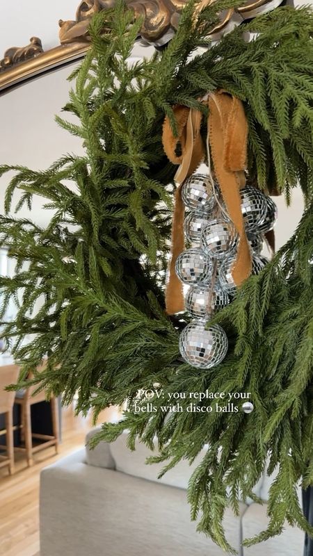 here’s your sign to add disco balls to everything this holiday season 🪩 -when the sun hits it just right it’s *magical* ✨ 

-save + share for Christmas inspo
-shop supplies in my LTK 💫
#christmasiscoming #christmasdiy #christmaswreath #whimsicalchristmas #discoball #christmashome #holidayseason 

#LTKHoliday #LTKSeasonal #LTKhome