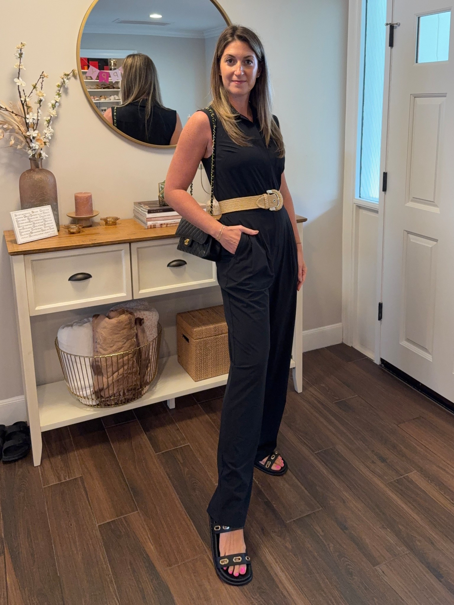 I love the ease of a good black jumpsuit. I dressed this down with a flat slide and raffia belt. Sharing some similar options. My sandals are currently on sale - they’re comfortable and I love that the gold hardware dresses them up!

#LTKOver40 #LTKSaleAlert #LTKTall