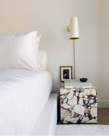 I loved this corner of my bedroom! This modern side table from 2modern is such a statement piece 🙌🏻 and the white/ gold sconces add the perfect touch with the white bedding look.

#LTKSeasonal #LTKhome