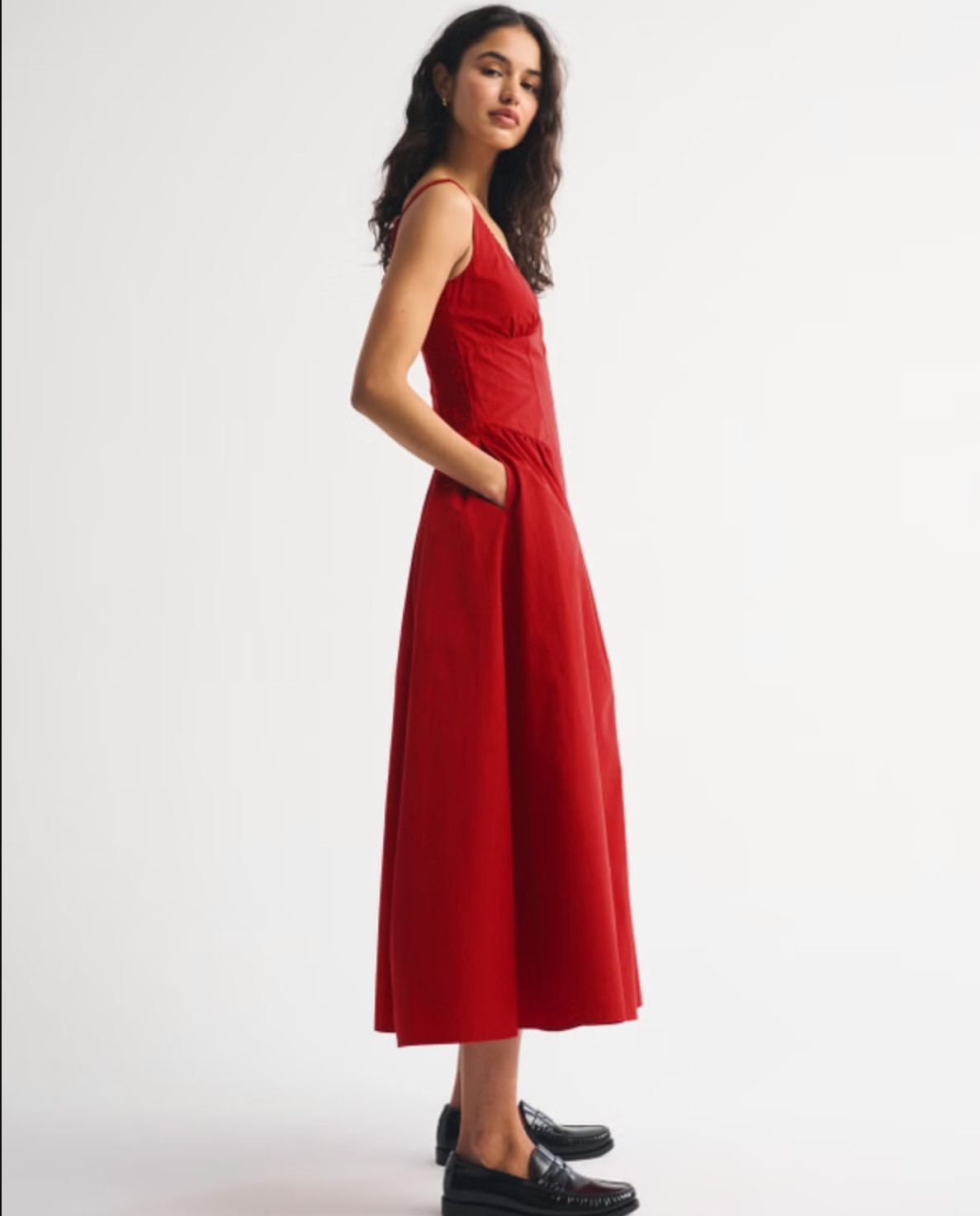 Effortless and flattering 🤍 The Abercrombie A&F Bra-Free Dylan Midi Dress is part of their bra-free collection, designed with built-in support (removable pads!) so you can skip the bra. It features a scoop neckline with delicate picot trim, adjustable straps, back smocking, and a dipped waist that flows into the prettiest skirt. The classic poplin fabric makes it perfect for everyday wear, brunch, or dressing up with heels ✨ 

 #LTKSpringSale #LTKdayinmylife #LTKSaleAlert