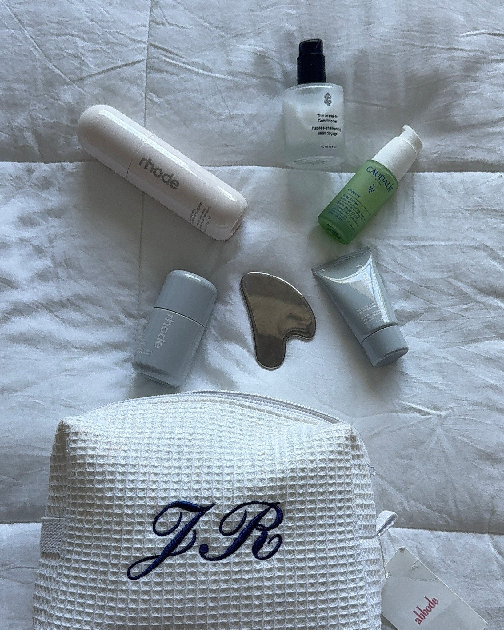 self care i always bring on trips 🛩️ rhode, caudalie, gua sha 

#LTKgrwm #LTKselfcare #LTKTravel