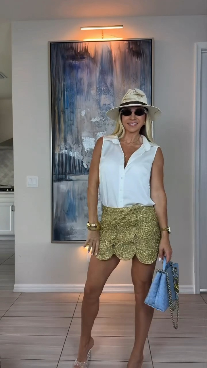One of those skirts that makes the whole outfit ✨

The gold detail is what sold me. It has such a pretty luxe look, but it’s still easy to style with a simple top, heels, and a fun bag. I’d wear this for a vacation dinner, girls’ night, rooftop drinks, or a dressier summer event. It also comes in other colors.
Wearing size S. 


gold mini skirt, vacation dinner outfit, resort wear, girls night outfit, summer party outfit, metallic fashion, statement piece, chic vacation outfit, summer style

#LTKTravel #LTKootd #LTKSeasonal